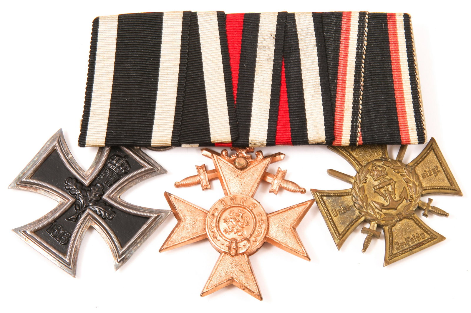 REPRODUCTION WWI GERMAN THREE BAR MEDAL WITH RIBBONS: REPRODUCTION WWI GERMAN THREE BAR MEDAL WITH RIBBONS Reproduction WWI German three bar medal, with Iron Cross 2nd Class, Bavarian Order of Merit, and German Navy Marine Cross. 