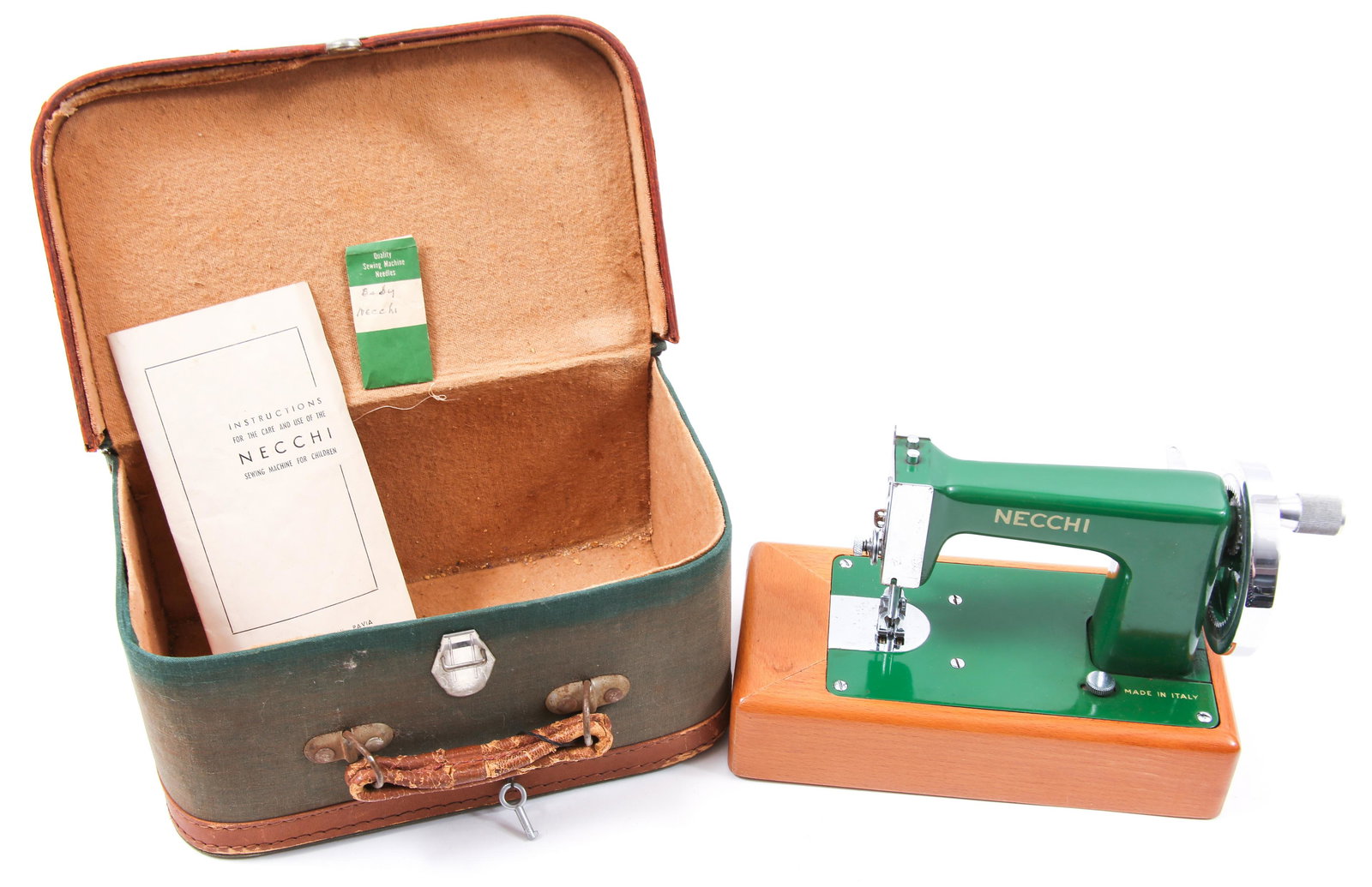BABY NECCHI HAND CRANK SEWING MACHINE WITH CASE: BABY NECCHI HAND CRANK SEWING MACHINE WITH CASE "Baby" Necchi chain stitch sewing machine for children, powered by hand crank. Includes instruction guide, extra needles, and case. Made in Italy. Size: