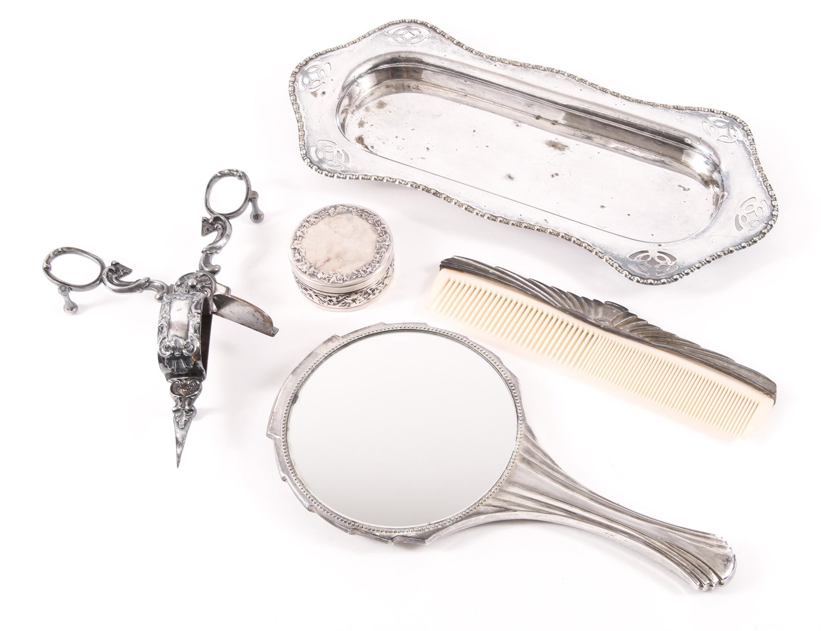 SILVER PLATED DRESSER PIECES - COMB, MIRROR, & MORE: SILVER PLATED DRESSER PIECES - COMB, MIRROR, & MORE Lot of silver plated dresser pieces, includes: Matching hand mirror and comb with art deco style pattern Openwork jewelry tray Repousse trinket box 