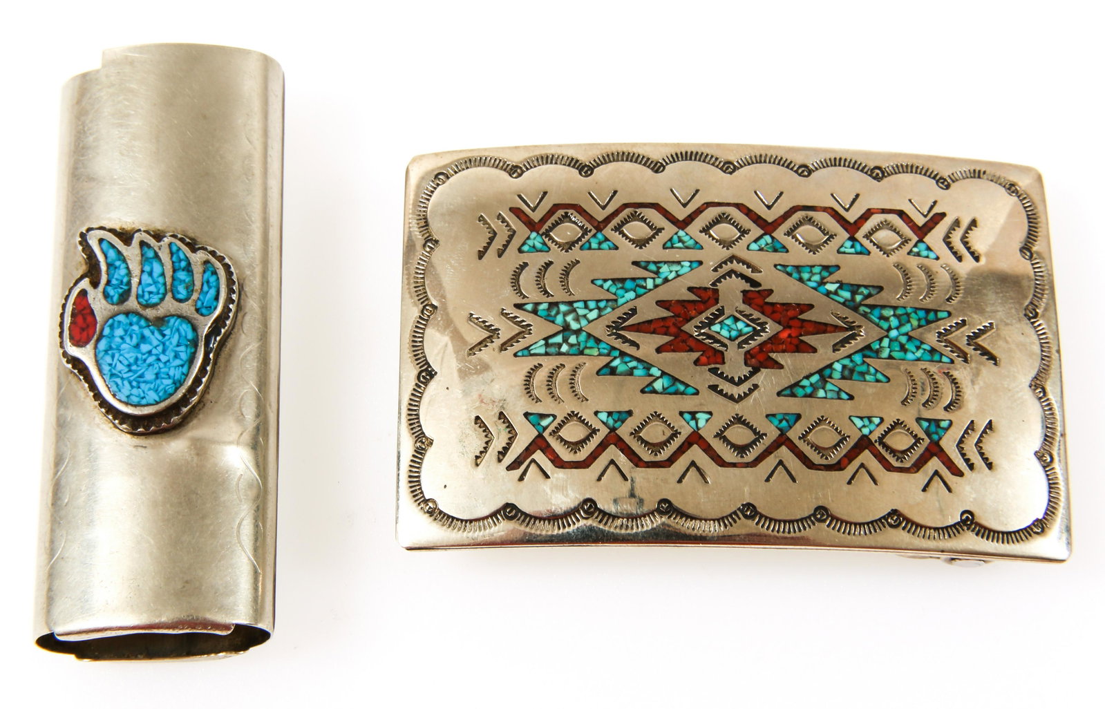 NICKEL SILVER TURQUOISE CORAL INLAY CASE & BUCKLE: NICKEL SILVER TURQUOISE CORAL INLAY CASE & BUCKLE Lot of two nickel silver items with turquoise and red coral inlay, one belt buckle marked Nakai Navajo, and one lighter case, unmarked. Size: 3"