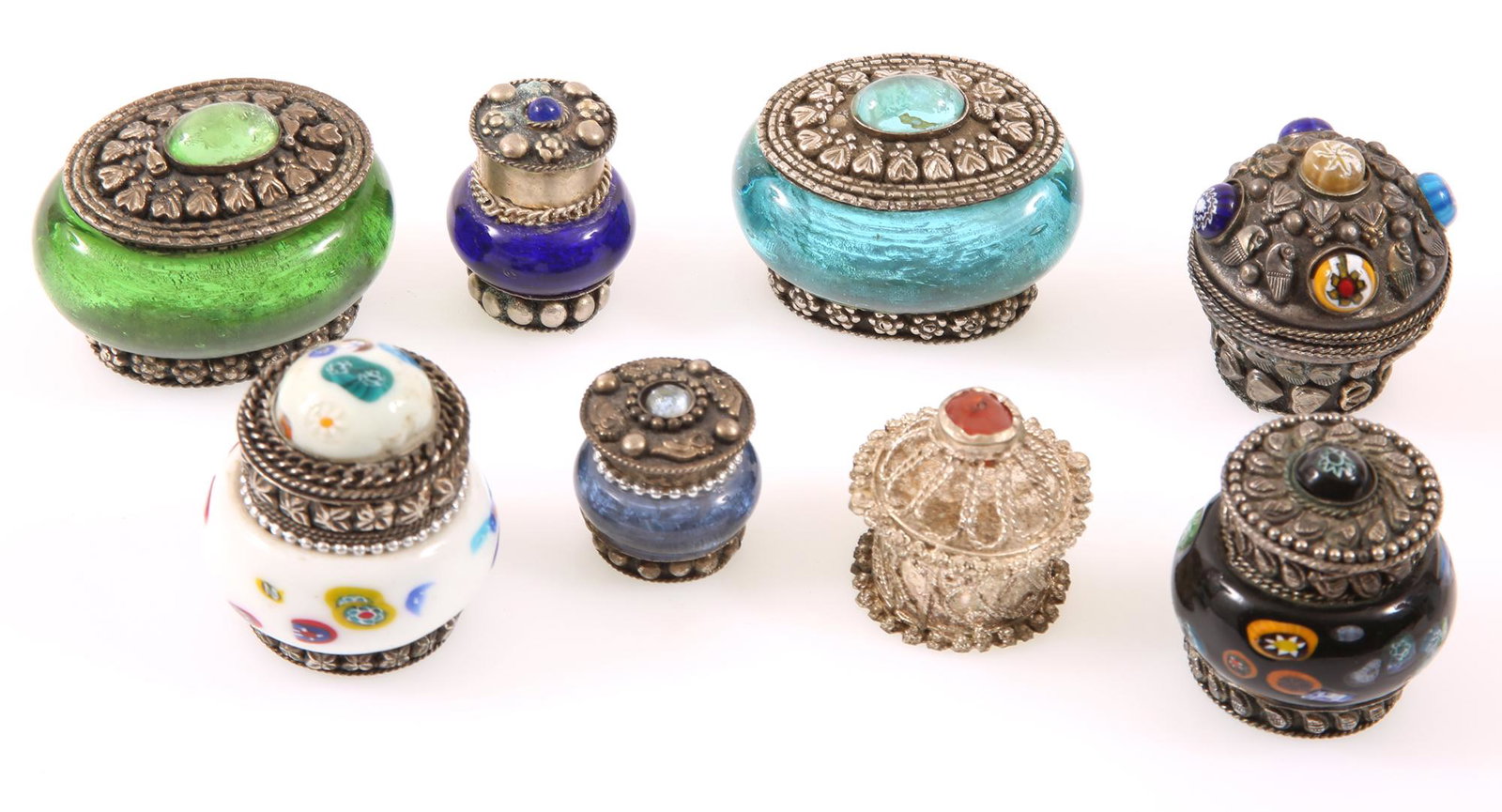 ART GLASS WHITE METAL TRINKET PILL BOXES - LOT OF 8: ART GLASS WHITE METAL TRINKET PILL BOXES - LOT OF 8 Lot of eight white metal trinket or pill boxes, most decorated with art glass, one with carnelian top. Size: Varied