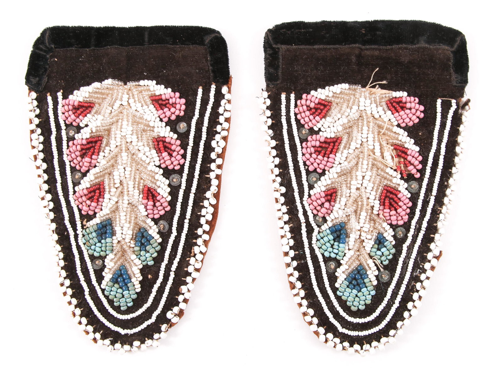 19TH C. IROQUOIS BEADWORK MOCCASIN VAMPS/UPPERS: 19TH C. IROQUOIS BEADWORK MOCCASIN VAMPS/UPPERS Pair of Iroquois Confederacy, raised beadwork vamps or uppers, for moccasins. Circa 19th century. The top is made of brown and black velvet, and the lin