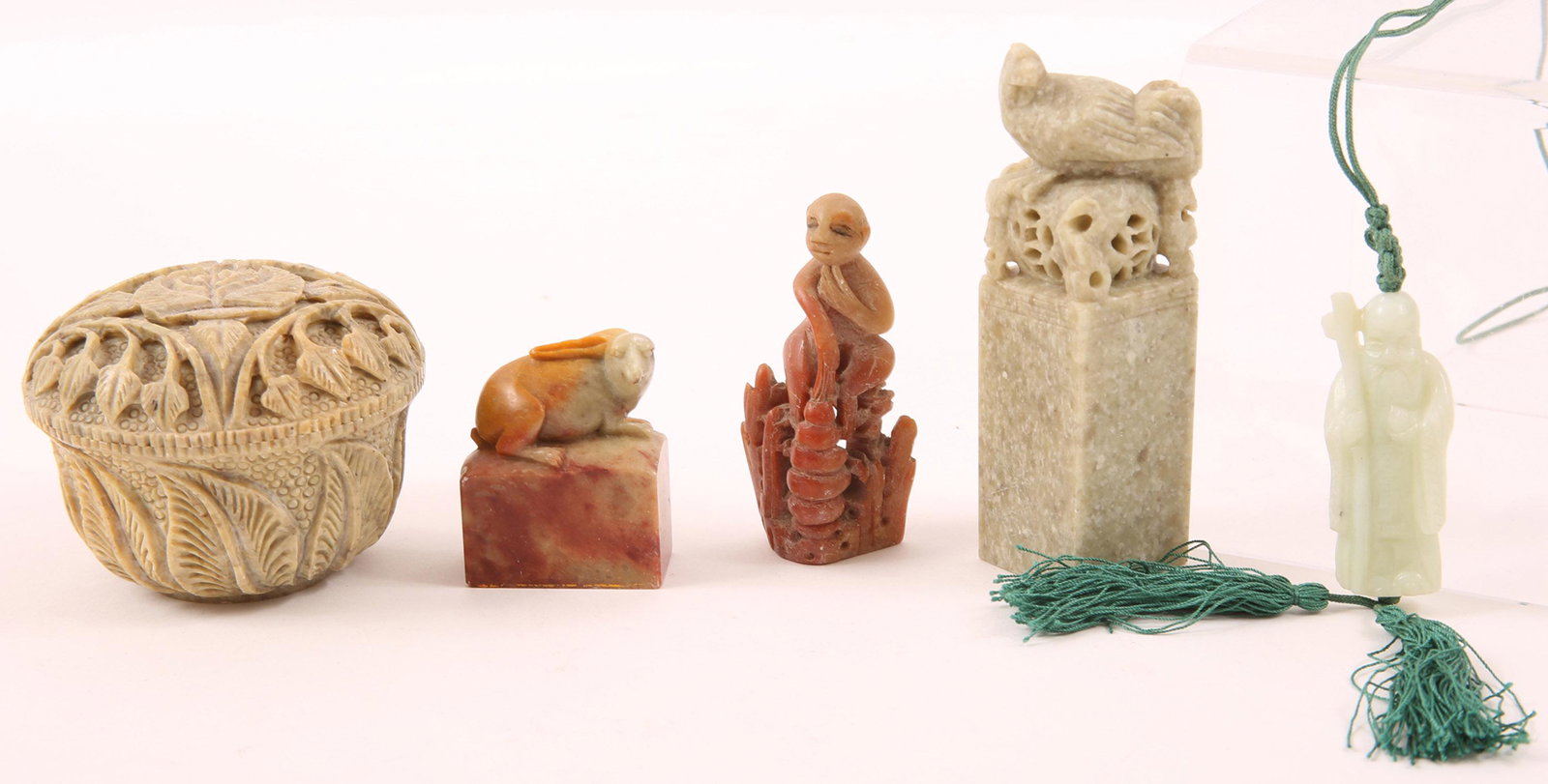 CHINESE CARVED SOAPSTONE JADE ITEMS - LOT OF 5: CHINESE CARVED SOAPSTONE JADE ITEMS - LOT OF 5 Lot of five Chinese carved stone items, to include soapstone trinket box with rose design; 3 x 2", chop with rooster finial; 4", chop with rabbit; 2", so