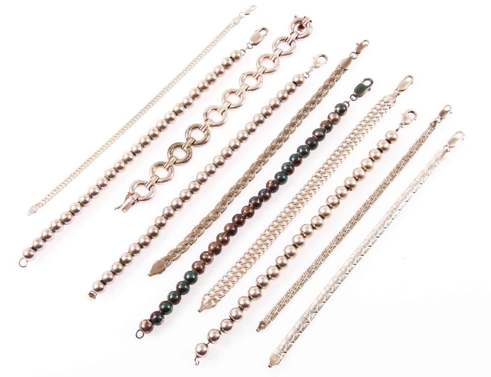STERLING SILVER BEAD BRACELETS AND CHAIN BRACELETS: STERLING SILVER BEAD BRACELETS AND CHAIN BRACELETS Lot of ten sterling silver chain and bead bracelets, all marked. Size: 7.5" - 8" Weight: 127.8 grams total