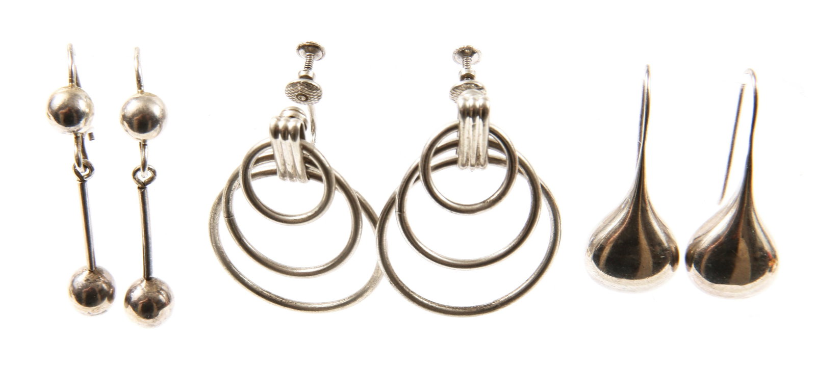 STERLING SILVER MODERNIST EARRINGS - LOT OF 3: STERLING SILVER MODERNIST EARRINGS - LOT OF 3 Three pairs of solid sterling silver modernist/minimalist earrings, to include Bayanihan tear drops; 1.25", ball and bar 1.5", and graduated hoops; 1.25".