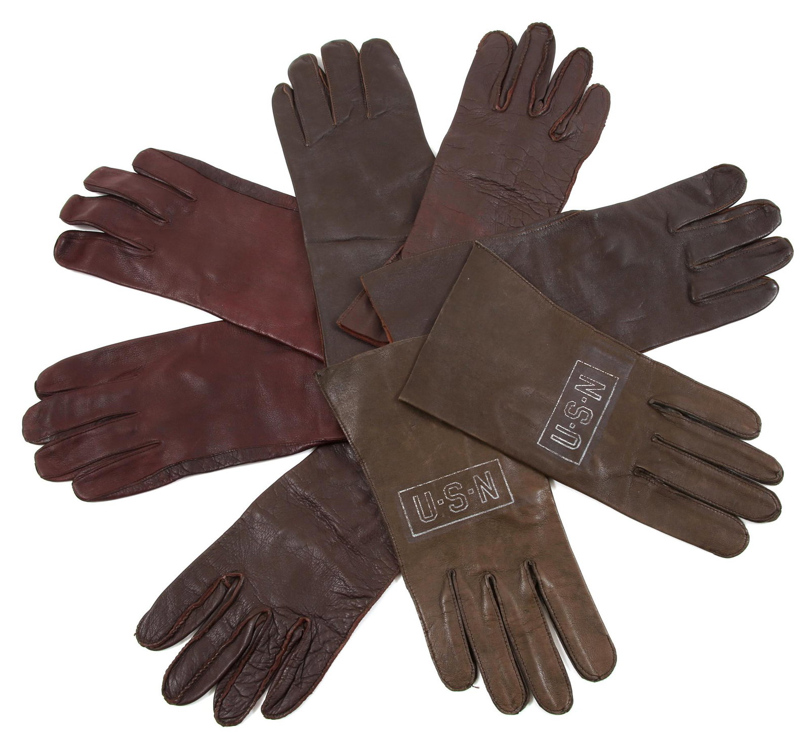 WWII ERA USN & USAAF LEATHER FLIGHT GLOVES - 4 PAIRS: WWII ERA USN & USAAF LEATHER FLIGHT GLOVES - 4 PAIRS Four pairs of WWII-era United States Navy and Army Air Force dark brown leather flight gloves.