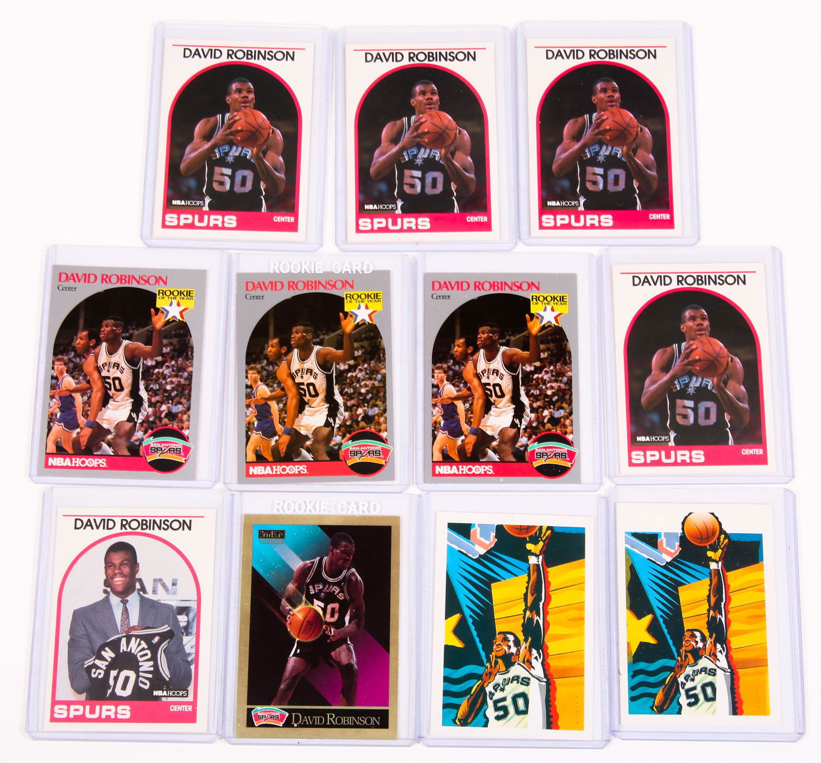 1989 & 1990 DAVID ROBINSON BASKETBALL CARDS - LOT OF 11: 1989 & 1990 DAVID ROBINSON BASKETBALL CARDS - LOT OF 11 Lot of 11 David Robinson basketball trading cards, including (4) NBA Hoops #310, (3) NBA Hoops #370, (2) NBA Hoops