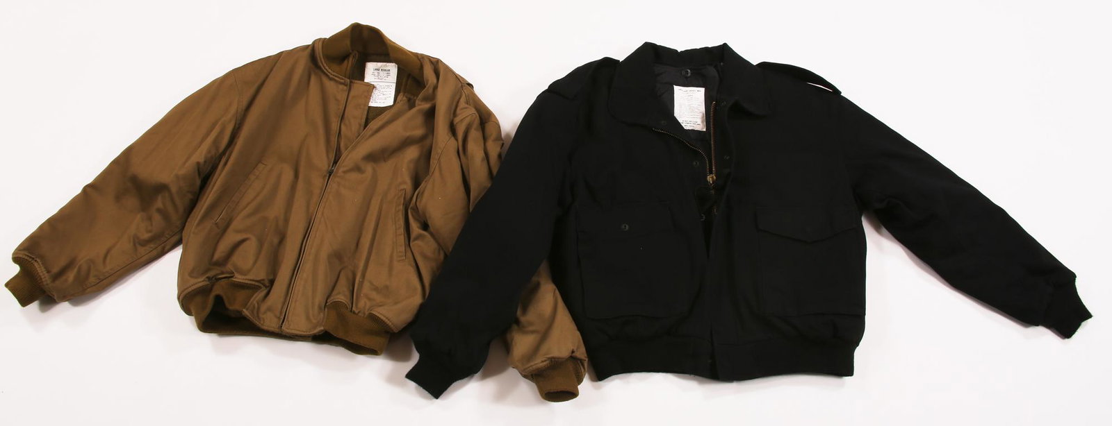 U.S. MILITARY FLIGHT JACKETS - LOT OF 2: U.S. MILITARY FLIGHT JACKETS - LOT OF 2 Lot of two military jackets, including: Black M-90 Pilot jacket with liner, spec no. 81586, size: Large. Sage green felt lined jacket, size: Large Regular. 