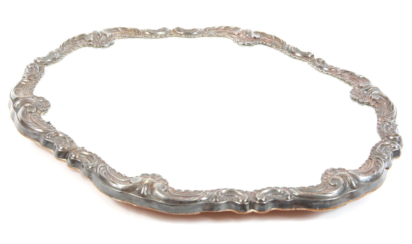 INDUSTRIA PERUANA STERLING SILVER PLATEAU MIRROR: INDUSTRIA PERUANA STERLING SILVER PLATEAU MIRROR Industria Peruana sterling silver plateau mirror. Wooden underside with 4 silver feet and a hook. Glass has slight bevel around the edges. Sterling