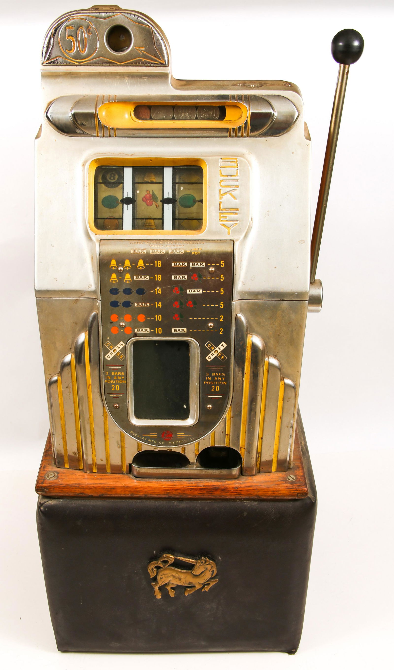 20TH C. BUCKLEY CRISS CROSS 50-CENT SLOT MACHINE: 20TH C. BUCKLEY CRISS CROSS 50-CENT SLOT MACHINE 20th century Buckley Manufacturing Co. Criss Cross 50-cent slot machine, on cushion lined base. Size: 41 x 16.5 x 15"
