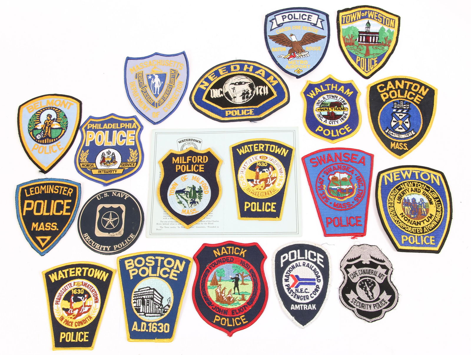 POLICE PATCHES & US NAVY COASTER - LOT OF 19: POLICE PATCHES & US NAVY COASTER - LOT OF 19 Lot of 19 mixed police and security patches, includes a variety of Massachusetts precincts, Philadelphia, Cape Canaveral, and others. Also includes leather