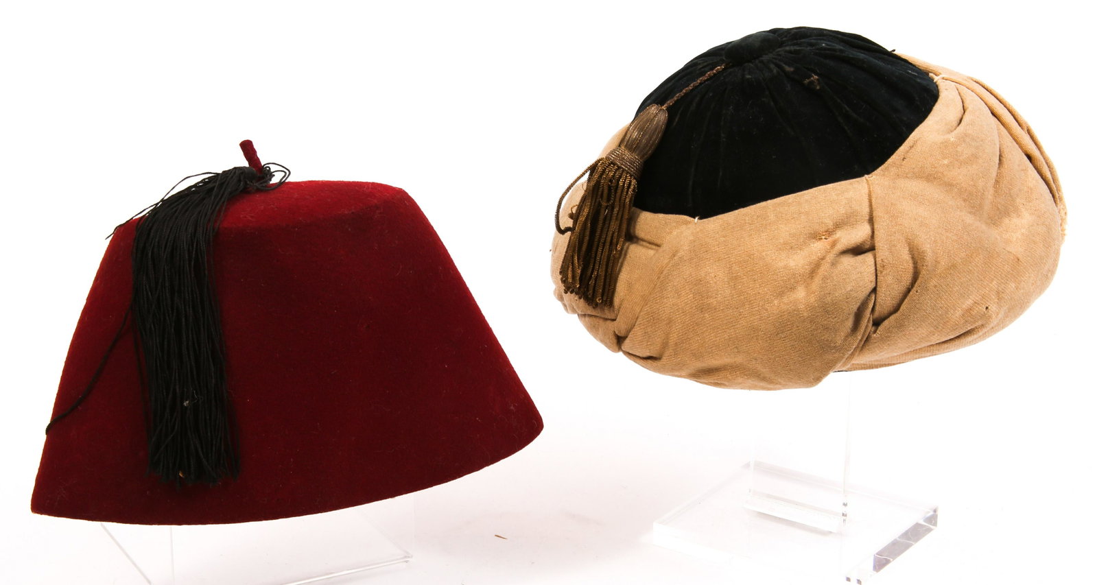 FEZ TARBOOSH & THEATER TURBAN CAP - LOT OF 2: FEZ TARBOOSH & THEATER TURBAN CAP - LOT OF 2 Lot of two Victorian era hats, to include a red felt fez with tassel and a theater turban style cap with wire tassel. Size: Medium