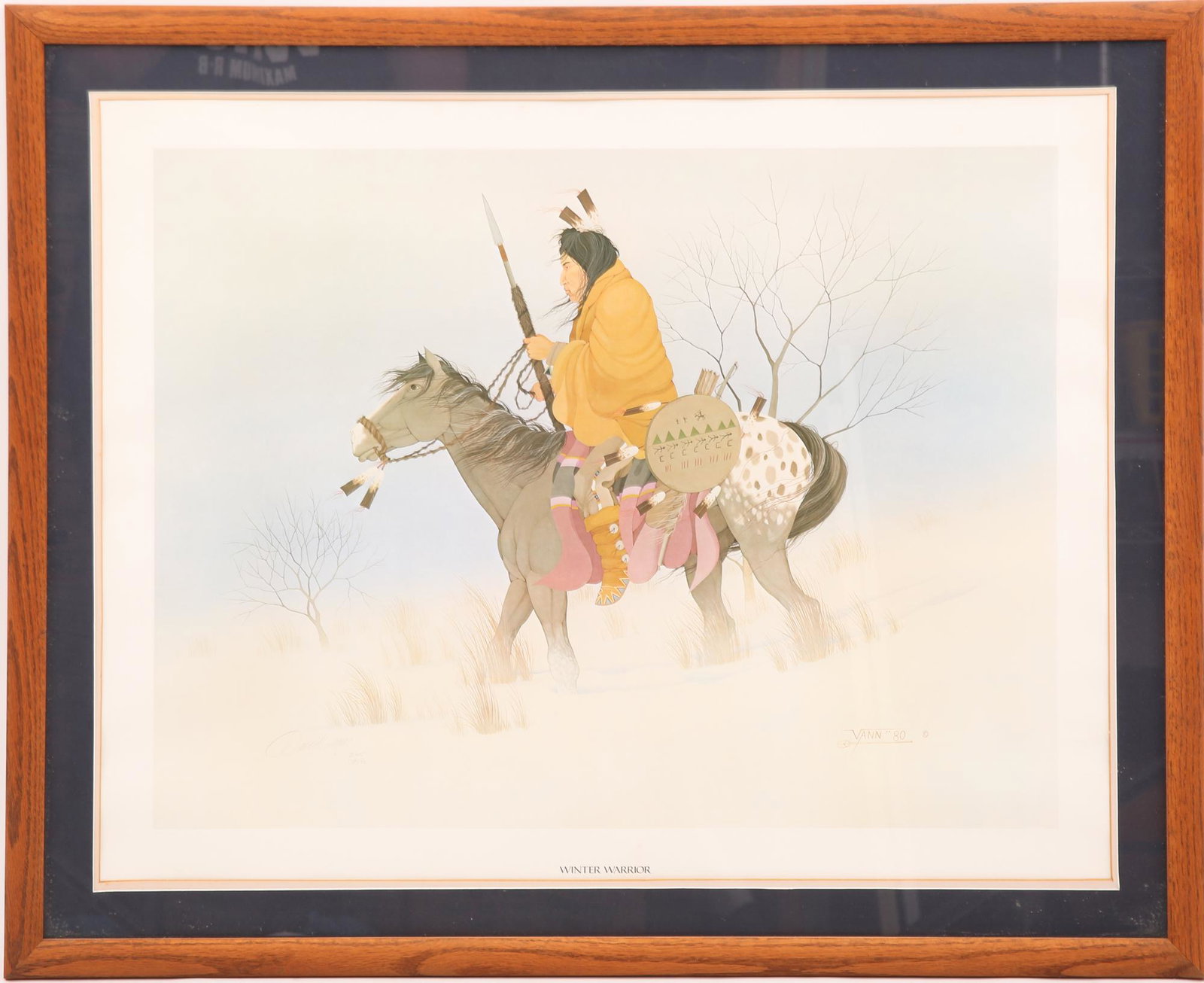 DONALD VANN WINTER WARRIOR SIGNED & NUMBERED LITHOGRAPH: DONALD VANN WINTER WARRIOR SIGNED & NUMBERED LITHOGRAPH Framed lithograph of "Winter Warrior" by Donald Vann, 1980. The lithographs depicts a Native American man holding a spear on a horse and riding 