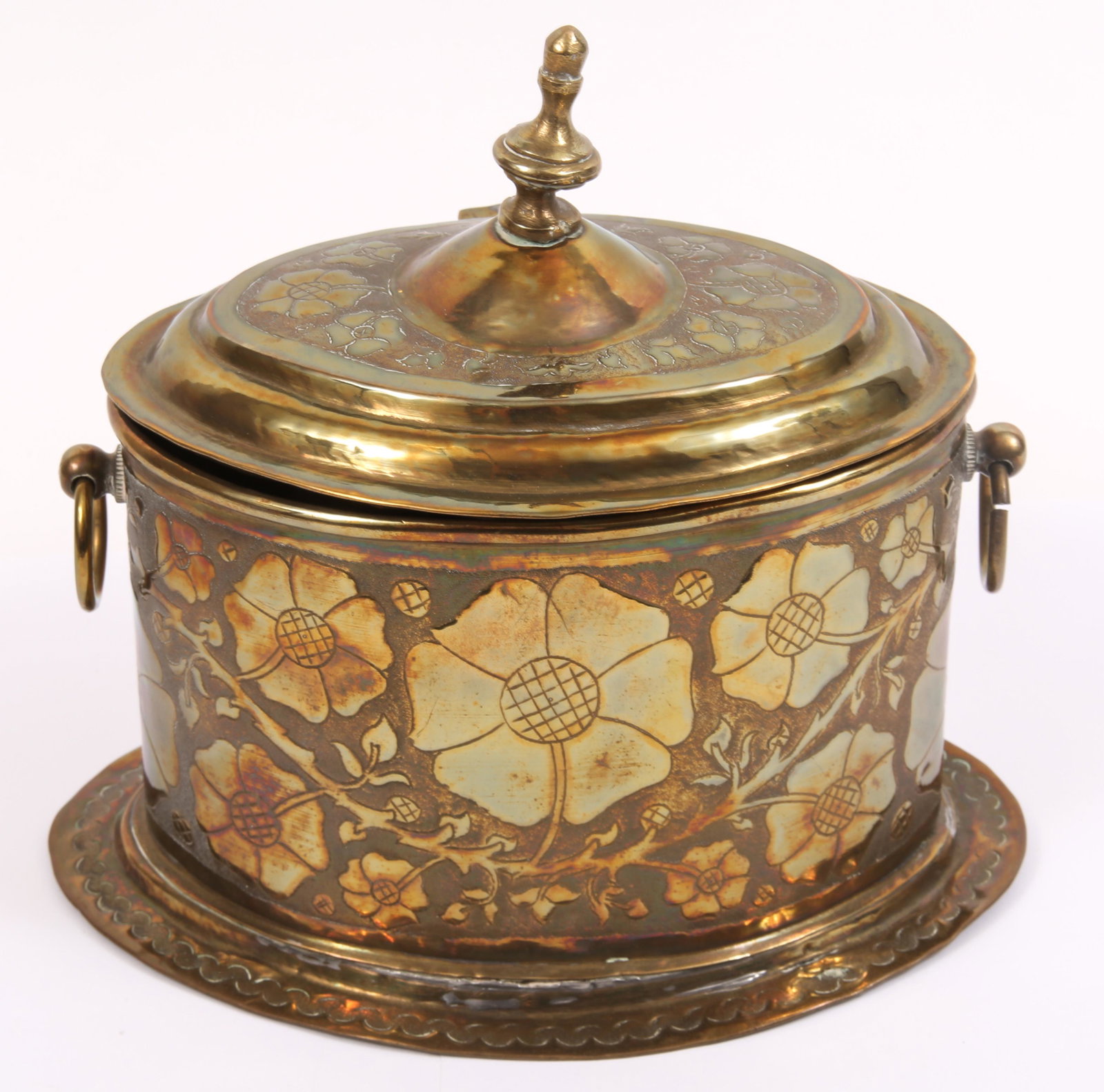 BRASS ENGLISH BISCUIT WARMER WITH FLORAL DESIGN: BRASS ENGLISH BISCUIT WARMER WITH FLORAL DESIGN Brass English biscuit warmer with attached lid. Embossed floral design throughout. Size: 9 x 7.5 x 8"