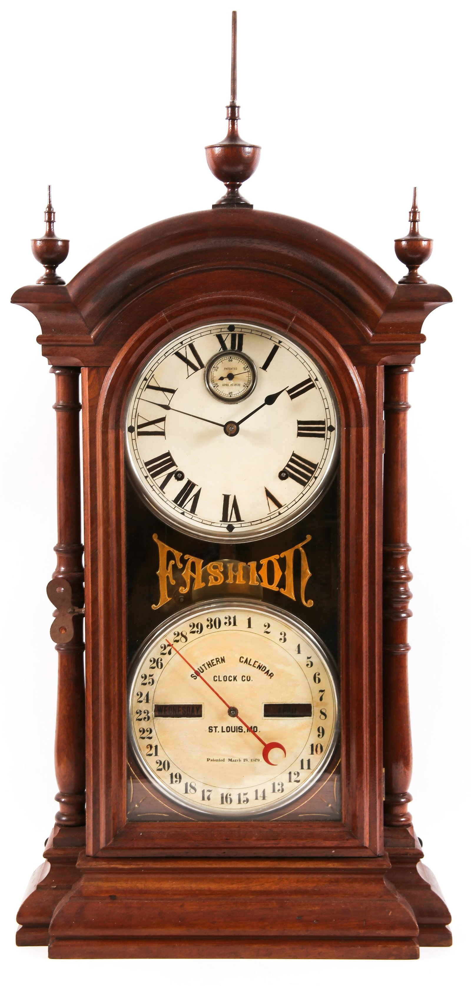 19TH C. SETH THOMAS FASHION #4 CALENDAR CLOCK: 19TH C. SETH THOMAS FASHION #4 CALENDAR CLOCK 19th century Seth Thomas Fashion No. 4 Double Dial Calendar clock, with red walnut case. Dimensions: 34 x 16 x 6".