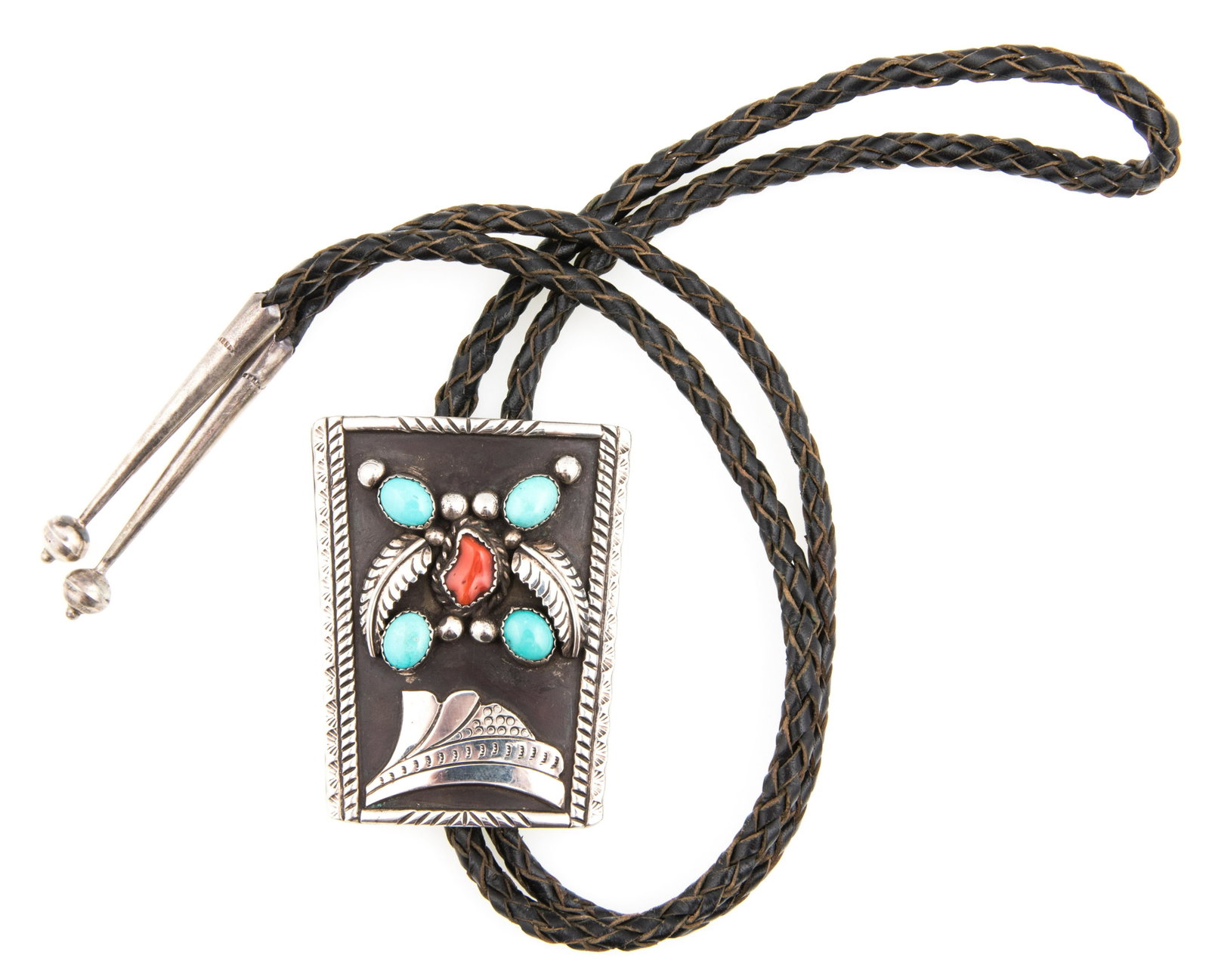 NATIVE AMERICAN STERLING TURQUOISE & CORAL BOLO TIE: NATIVE AMERICAN STERLING TURQUOISE & CORAL BOLO TIE Native American sterling silver and braided leather bolo tie, inlaid with turquoise and coral with feather design. Marked BENNETT. PAT. PEND C-31" o