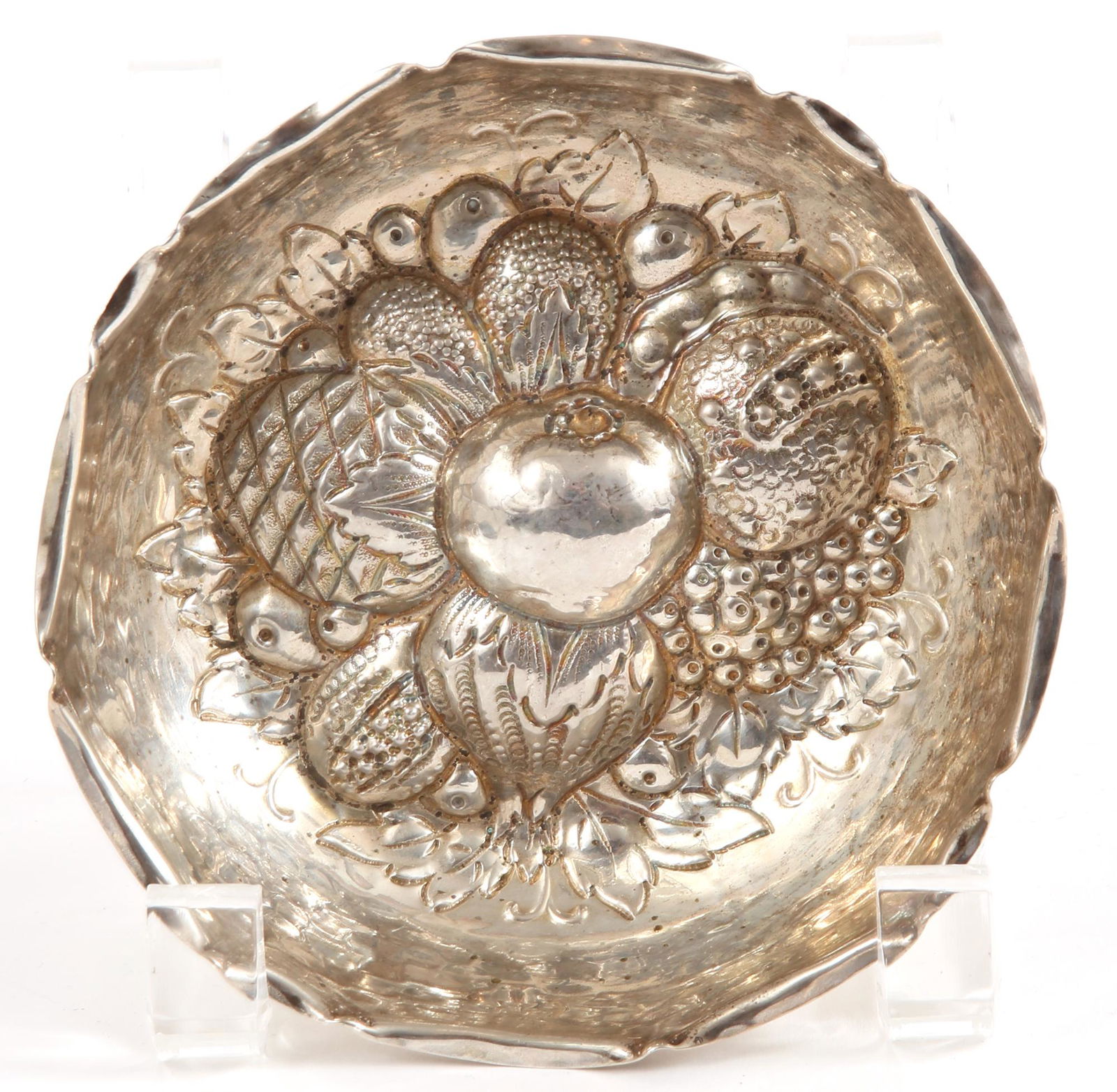 BRUCKMANN & SOHNE .800 STERLING SILVER CANDY DISH: BRUCKMANN & SOHNE .800 STERLING SILVER CANDY DISH Bruckmann & Söhne .800 sterling silver candy dish with fruit repousse design. Size: 4.75" Weight: 79.2g