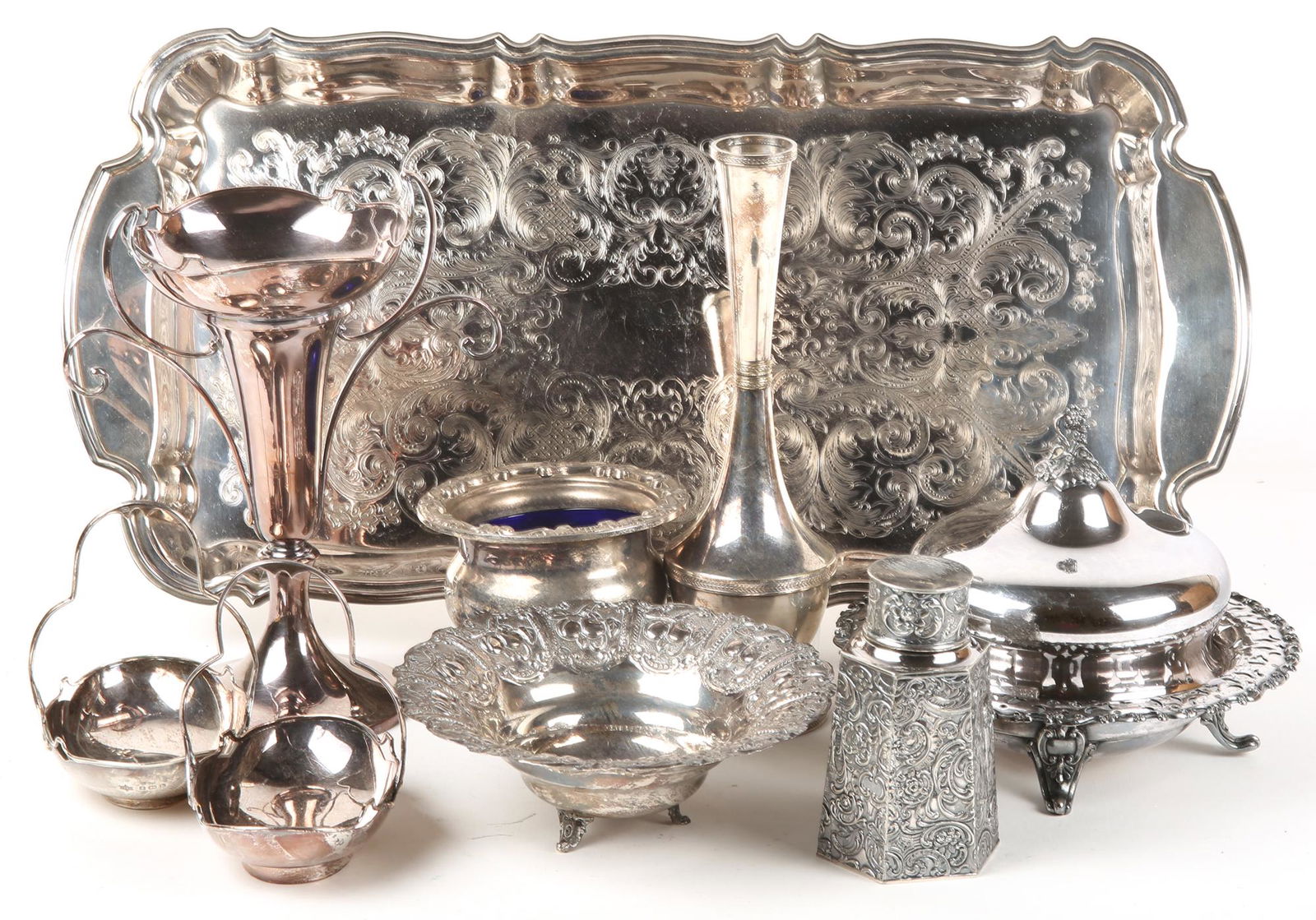 SILVER PLATED SERVEWARE & VASES - LOT OF 9: SILVER PLATED SERVEWARE & VASES - LOT OF 9 Lot of 9 pieces of silver plated serveware and vases. Includes: Two vases Domed serving dish Serving tray Lidded jar Four small serving dishes