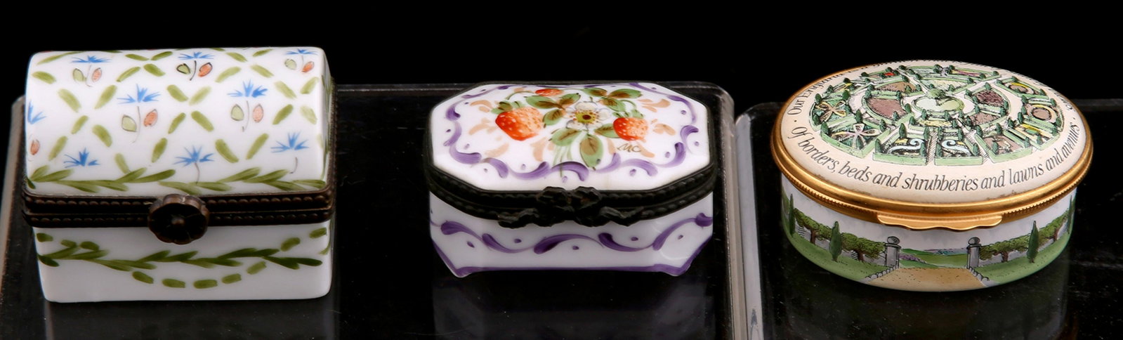 HALCYON DAYS AND LIMOGES TRINKET BOXES - LOT OF 3: HALCYON DAYS AND LIMOGES TRINKET BOXES - LOT OF 3 Lot of 3 porcelain trinket boxes. Includes: Halcyon Days oval trinket box, 2 x 1.5 x 1". Limoges 8-sided, hand painted trinket box, 2
