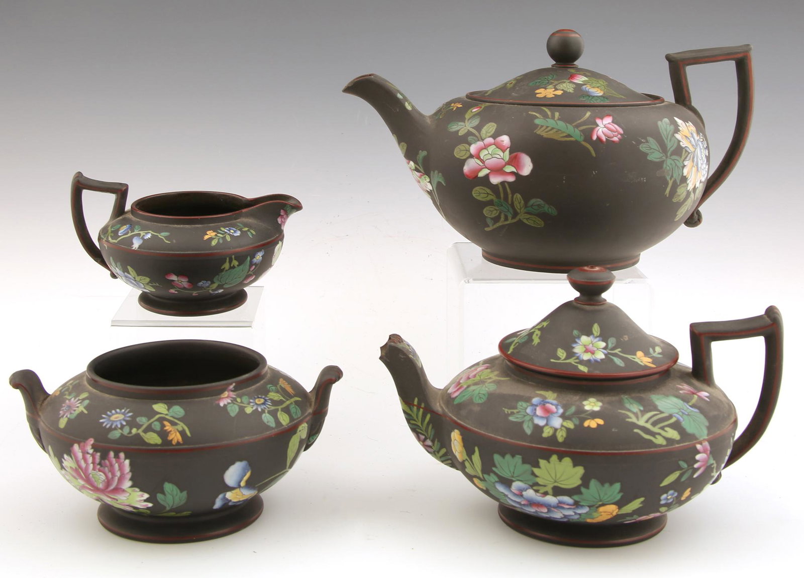 WEDGWOOD CAPRIWARE TEA & COFFEE SET - LOT OF 4: WEDGWOOD CAPRIWARE TEA & COFFEE SET - LOT OF 4 Wedgwood capriware 4-piece tea and coffee set. Includes: Coffee pot, 9.25 x 6 x 5". Chipped on lip of spout. Tea pot, 7.5 x 5.5 x 4". Chipped on lip of s