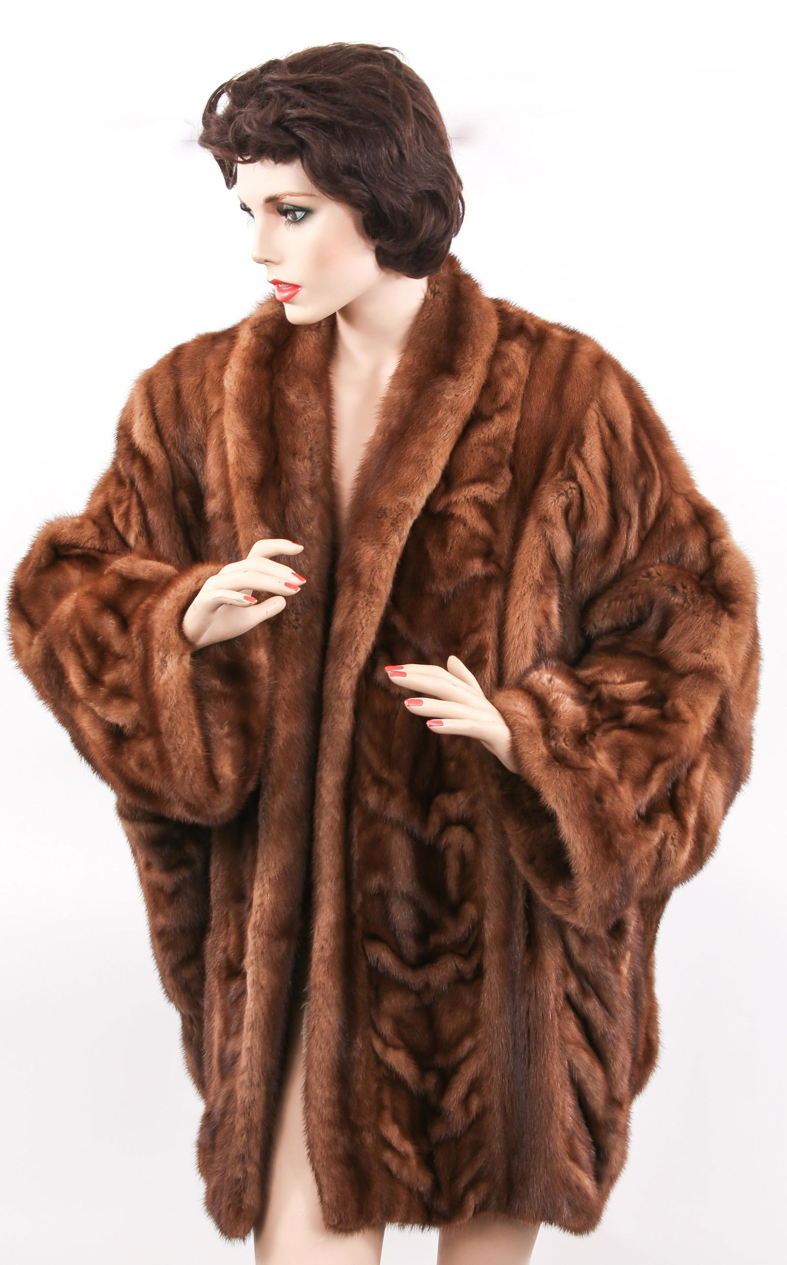 WOMEN'S FEDERICO BANO MINK FUR MID-LENGTH COAT: WOMEN'S FEDERICO BANO MINK FUR MID-LENGTH COAT Women's Federico Bano demi buff mink fur mid-length coat. Measurements: 20" shoulder to shoulder. 34" collar to hem. 18" sleeve.
