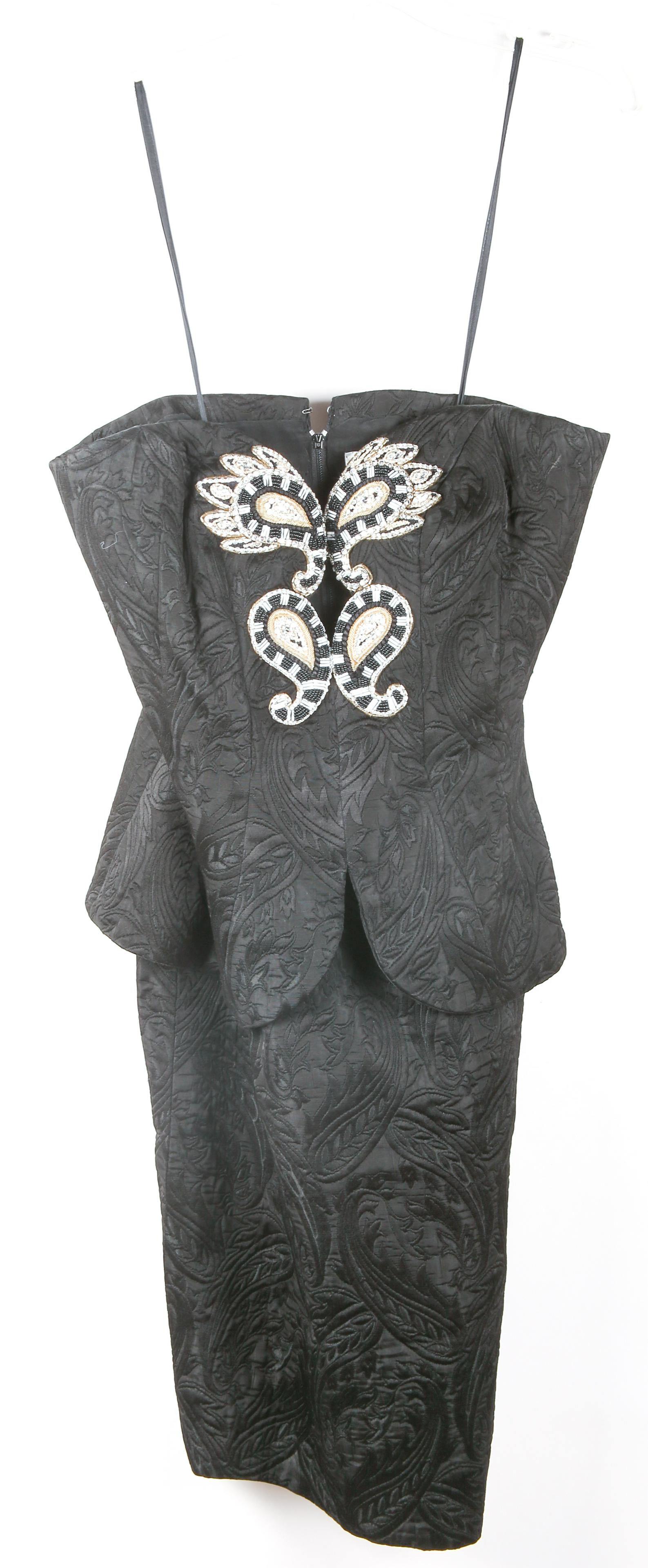 WOMEN'S BOB MACKIE 1980s BLACK BROCADE BUSTIER DRESS: WOMEN'S BOB MACKIE 1980s BLACK BROCADE BUSTIER DRESS Women's Bob Mackie 1980s era black brocade strapless bustier dress, with embellished plunging neckline. Measurements: 32" bust 26" waist <