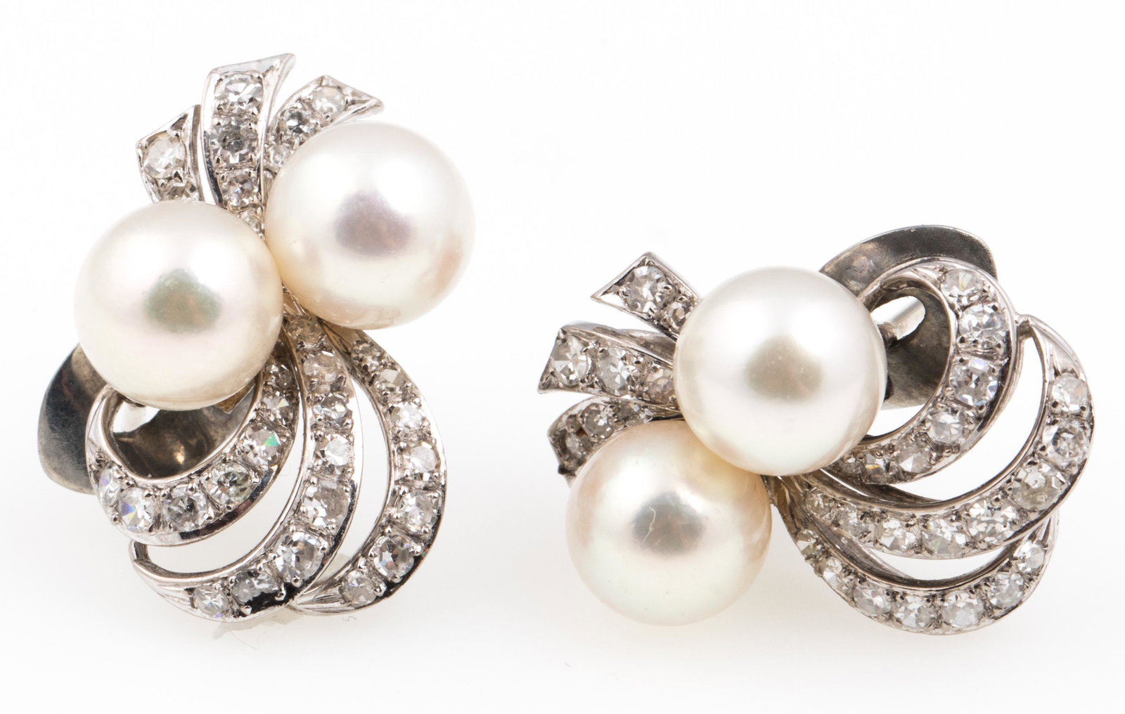 14K WHITE GOLD PEARL & DIAMOND EARRINGS: 14K WHITE GOLD PEARL & DIAMOND EARRINGS 14K white gold pearl and diamond earrings with: Two 8mm pearls per earring Thirty-one approximately .007 ct round white diamonds per earring Approximately 0.2