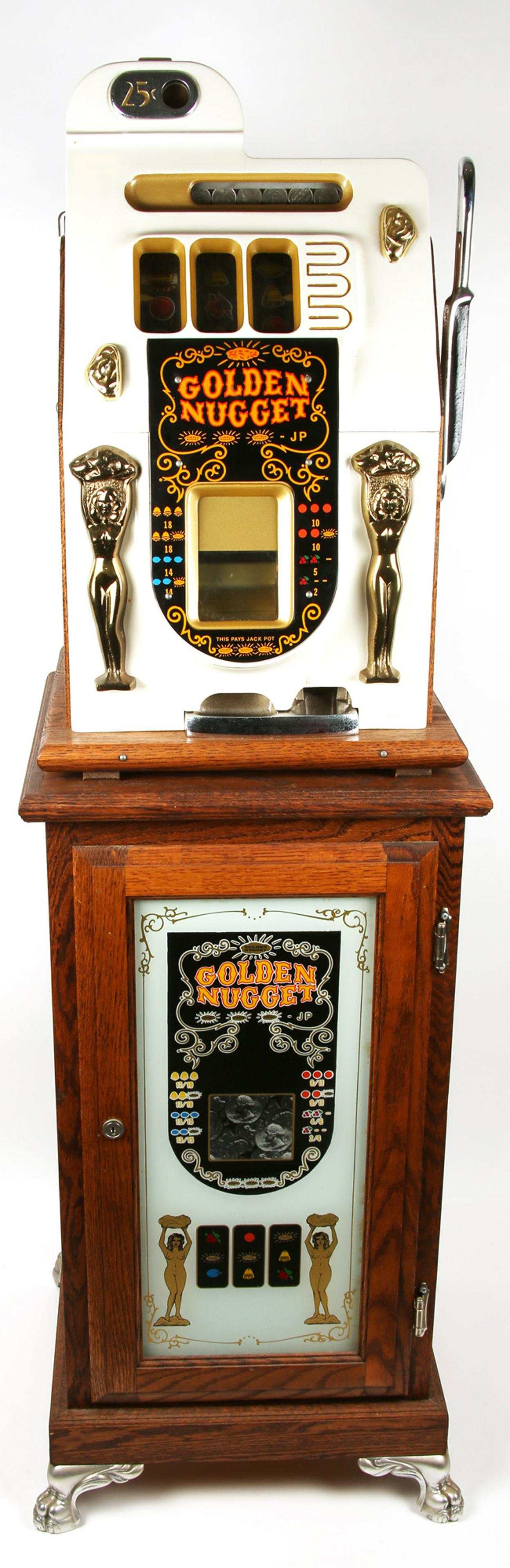 MILLS 25 CENT GOLDEN NUGGET SLOT MACHINE & BASE: MILLS 25 CENT GOLDEN NUGGET SLOT MACHINE & BASE Mills Golden Nugget 25 cent slot machine in white with clawfoot wood base. Includes key. Slot machine dimensions: 1