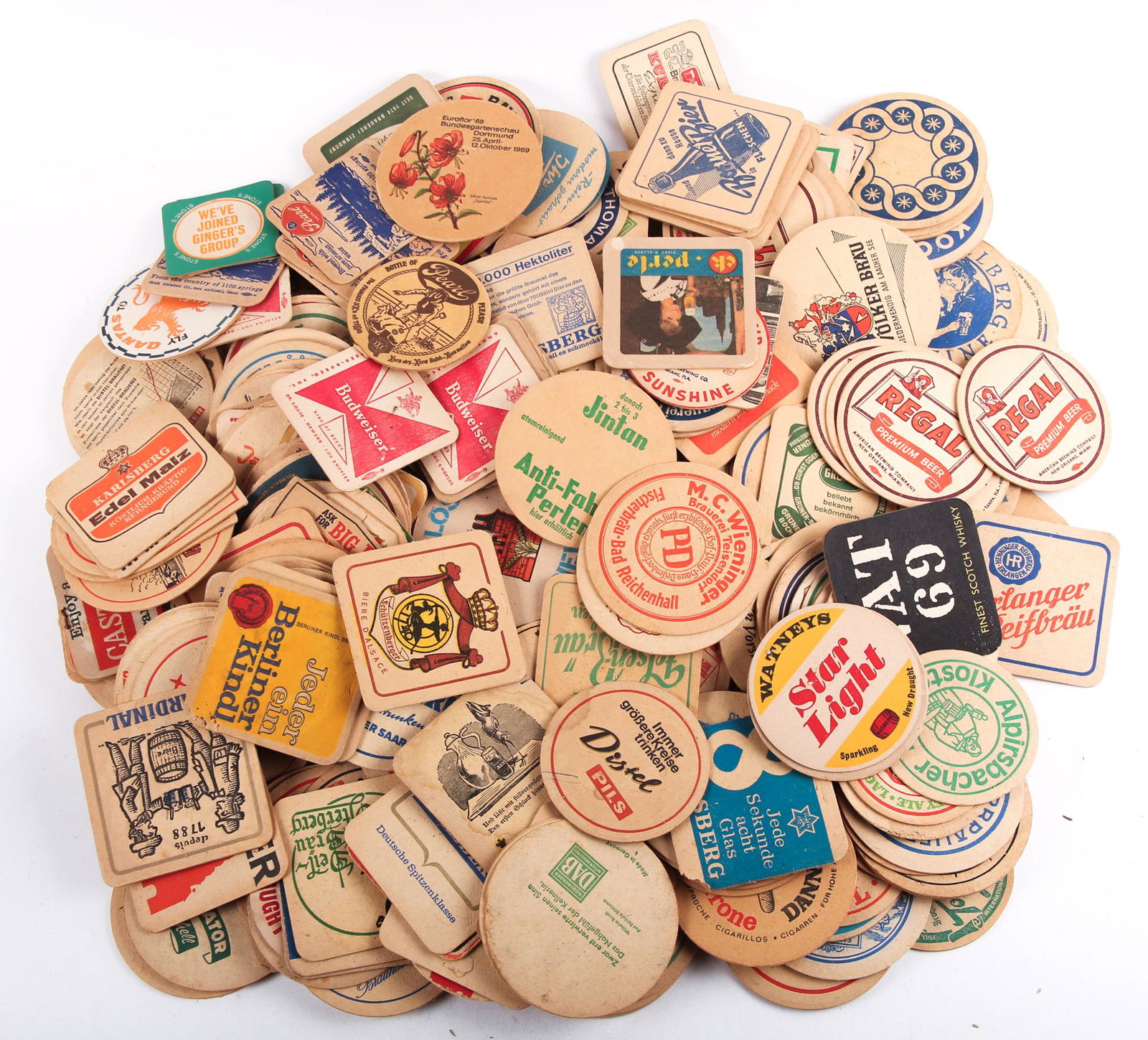20TH CENTURY US & INTERNATIONAL BAR COASTER LOT OF 250+: 20TH CENTURY US & INTERNATIONAL BAR COASTER LOT OF 250+ Lot of 250 plus 20th century drink coasters from US and International beverage companies. Range in size from 3" to 4.50" Size: 3" to 4.50"