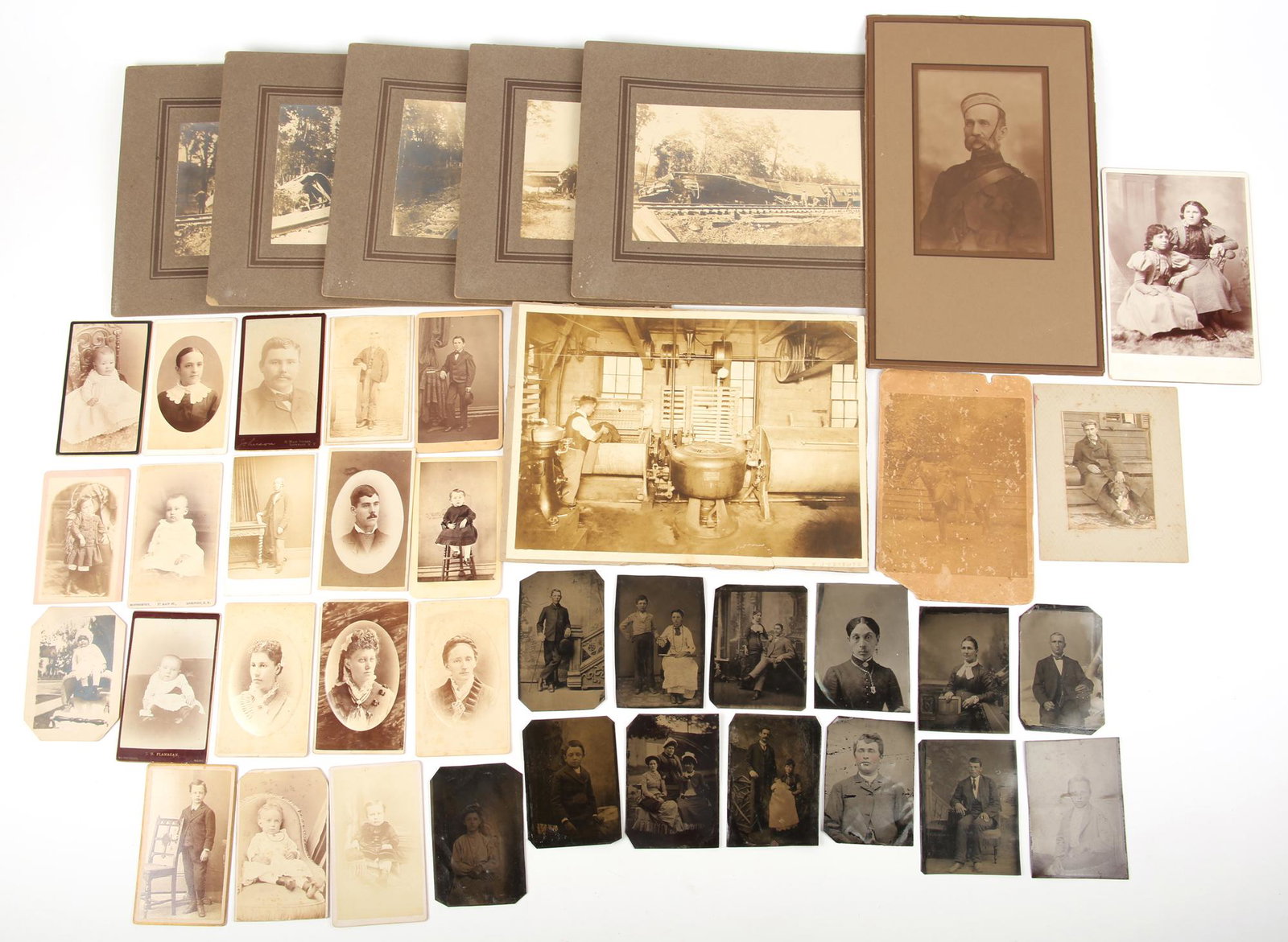 EARLY PHOTOGRAPHY LOT OF 41: EARLY PHOTOGRAPHY LOT OF 41 Lot of 41 early photographic images. Formats include photo print, tintype, carte de visite, and cabinet card. Subjects vary. Inlcudes: 1 1950s photo print. Measures 2.
