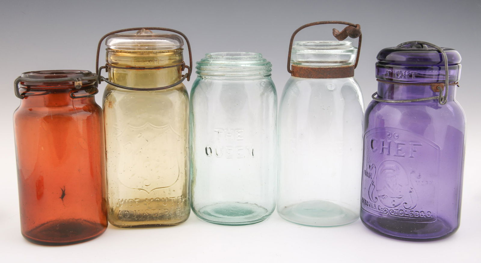LATE 19TH/EARLY 20TH C. GLASS JARS - LOT OF 5: LATE 19TH/EARLY 20TH C. GLASS JARS - LOT OF 5 Lot of 5 late 19th and early 20th century glass jars. Includes: Purple Chef jar with lid and ring. Marked "Chef Trade Mark Berdan & Co. Toledo O." Me