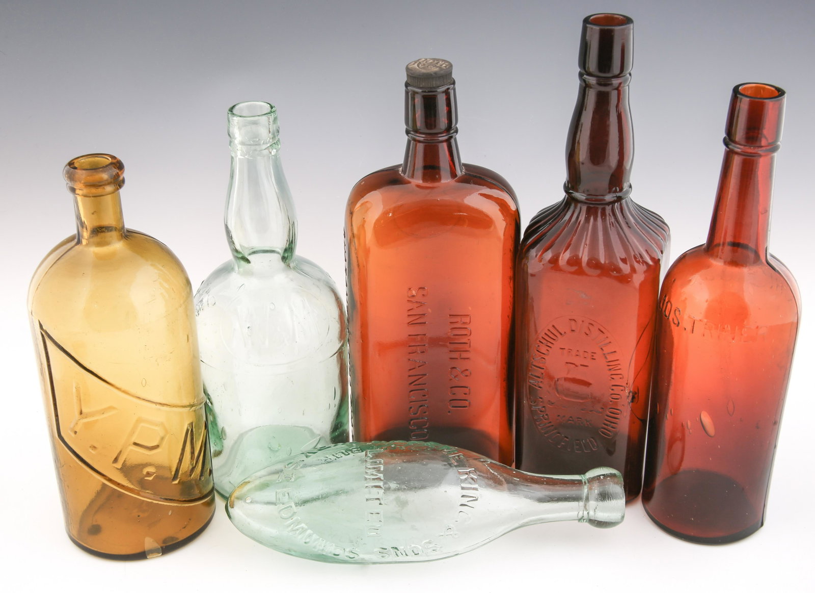 LATE 19TH & 20TH C. WHISKEY BOTTLES - LOT OF 6: LATE 19TH & 20TH C. WHISKEY BOTTLES - LOT OF 6 Lot of 6 late 19th and 20th century whiskey bottles. Includes: Whyte & Mackay bottle. Marked "Whyte and Mackay Glasgow." Measures 10" tall and 3.75" 