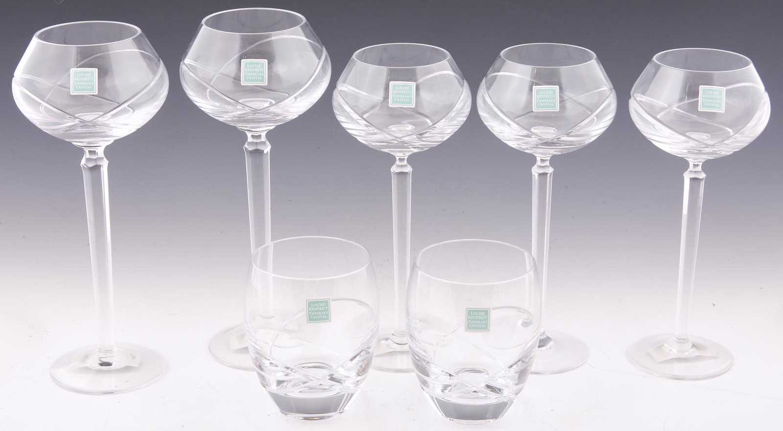 LOUISE KENNEDY TIPPERARY CRYSTAL GLASSES & TUMBLERS: LOUISE KENNEDY TIPPERARY CRYSTAL GLASSES & TUMBLERS Louise Kennedy Tipperary Crystal in Sea Aster pattern, includes: Two red wine glasses, 9.5" Three white wine glasses, 8.75" Two tumblers