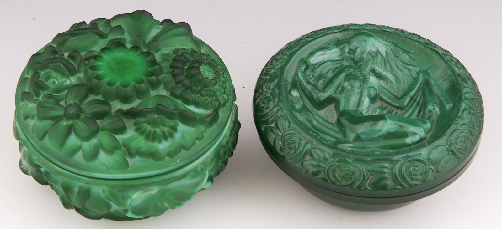 MALACHITE GLASSWARE COVERED DISHES - LOT OF 2: MALACHITE GLASSWARE COVERED DISHES - LOT OF 2 Lot of 2 Czechoslovakian malachite glassware decorative covered dishes. Includes: Flower motif dish, 4 x 2.25". Marked "Made in Czechoslovakia." Female n