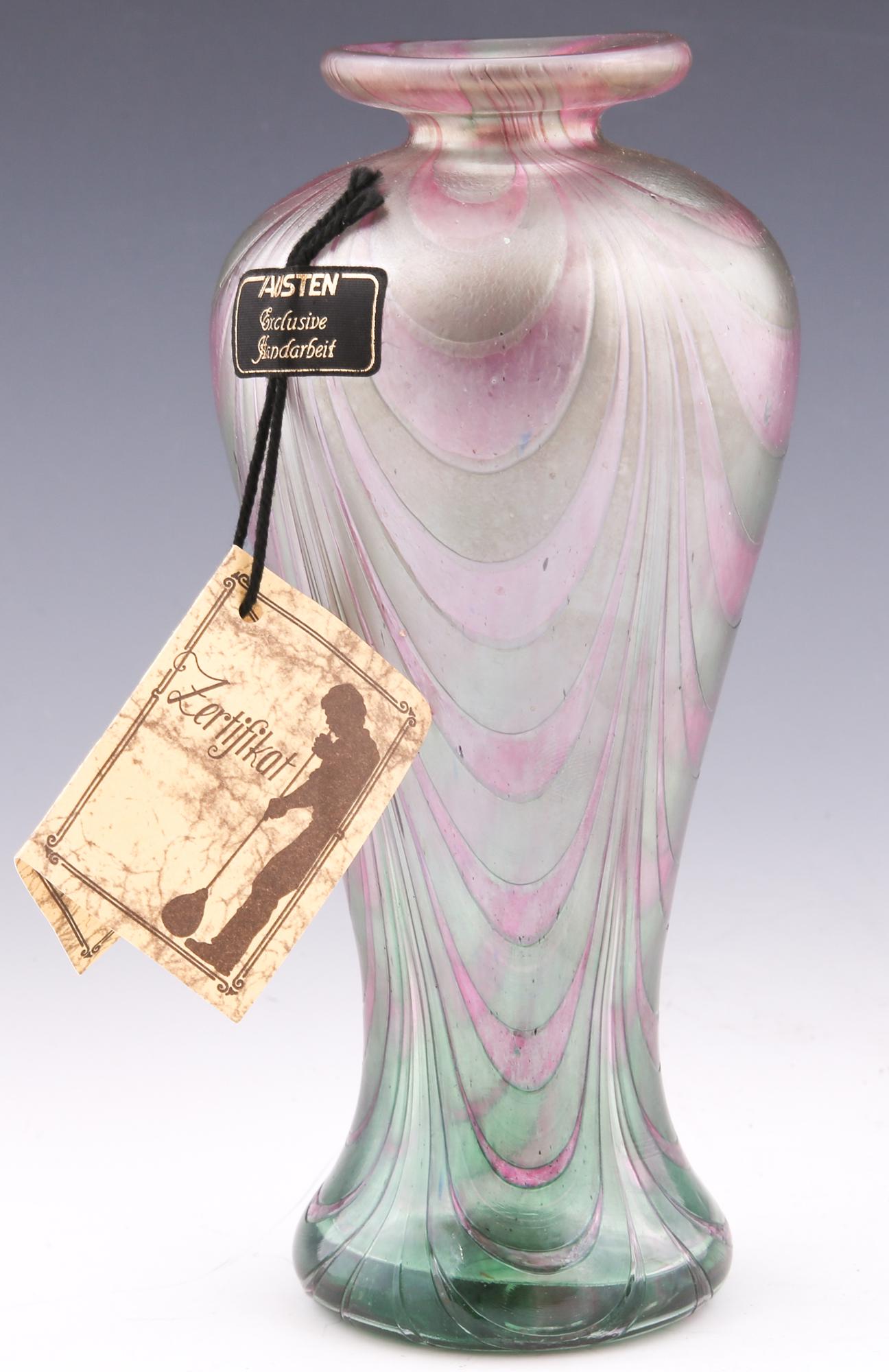 FRANZ AUSTEN IRIDESCENT ART GLASS VASE: FRANZ AUSTEN IRIDESCENT ART GLASS VASE Franz Austen Bavarian art glass vase, iridescent pink and green. Signed on underside, includes original certificate. Size: 7.5"