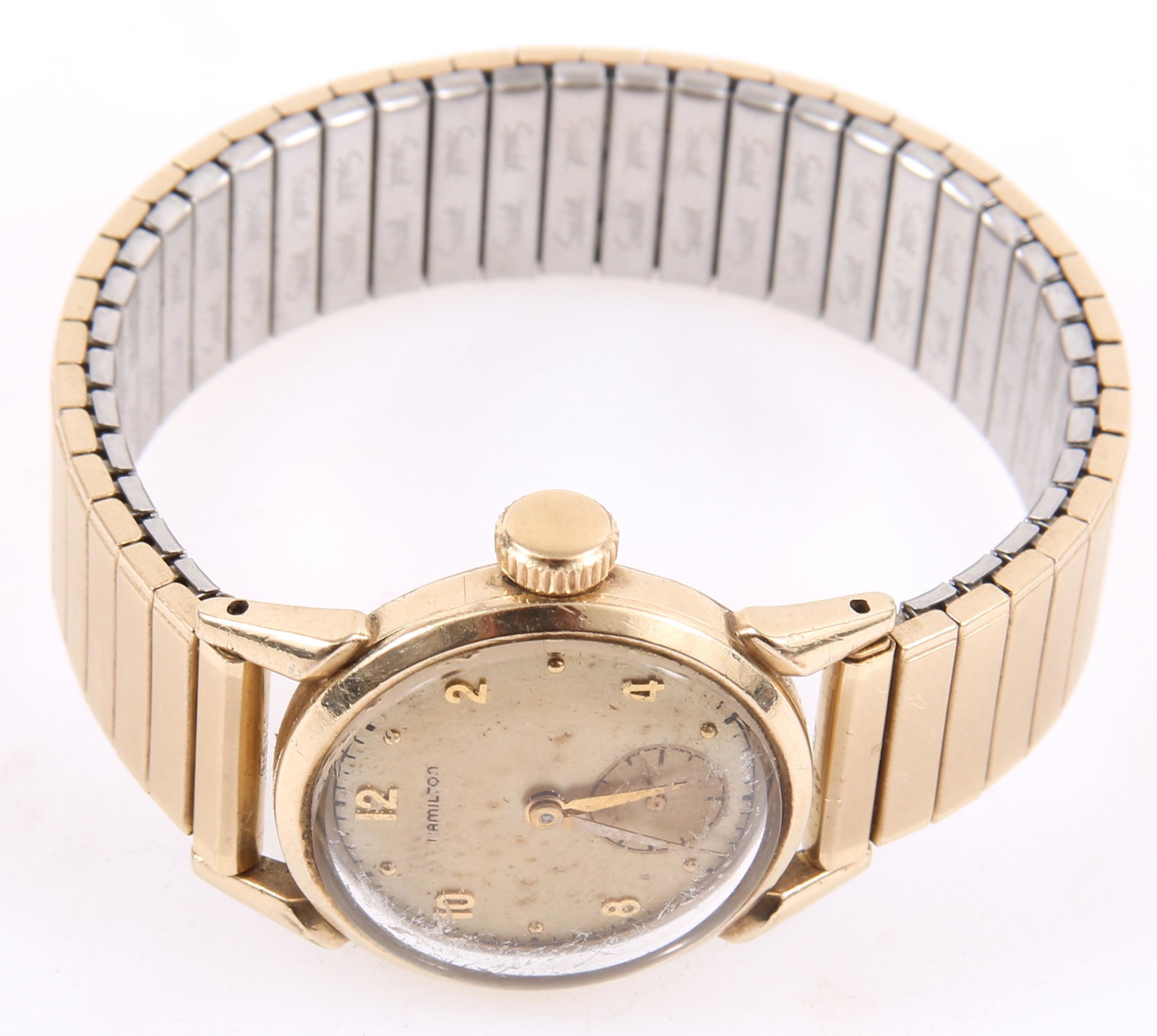 MID-20TH C. HAMILTON 747 GOLD FILLED WRISTWATCH: MID-20TH C. HAMILTON 747 GOLD FILLED WRISTWATCH Mid-20th century Hamilton gold filled wristwatch, with: 747 movement Serial number: Y111031 17 jewels Case number: S957950 Mode