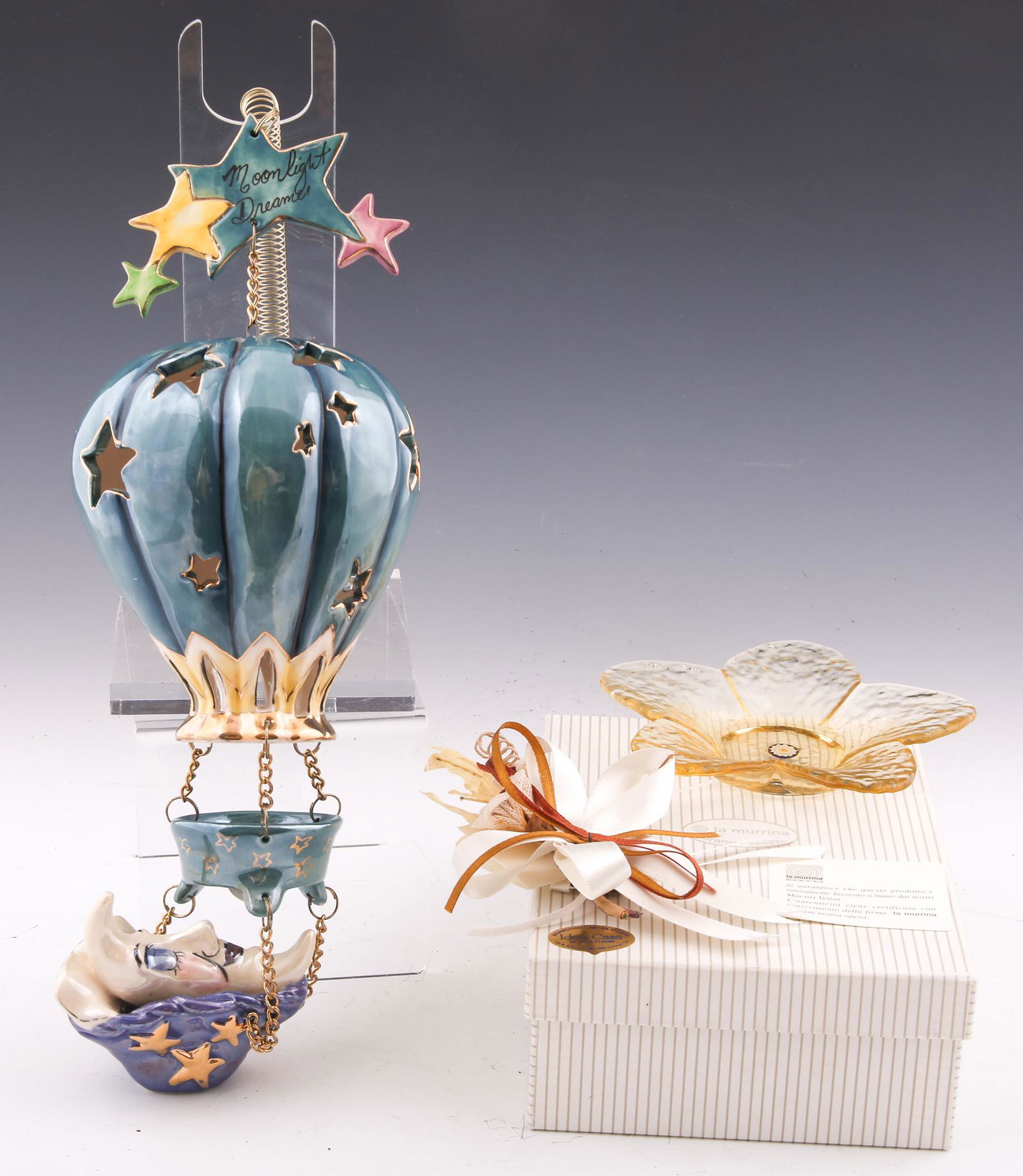 LA MURRINA & BLUE SKY CLAYWORKS DECOR PIECES: LA MURRINA & BLUE SKY CLAYWORKS DECOR PIECES Decor pieces, including: La Murrina flower jewelry dish with small synthetic flower boutonnière Includes original box. 5 x 1"