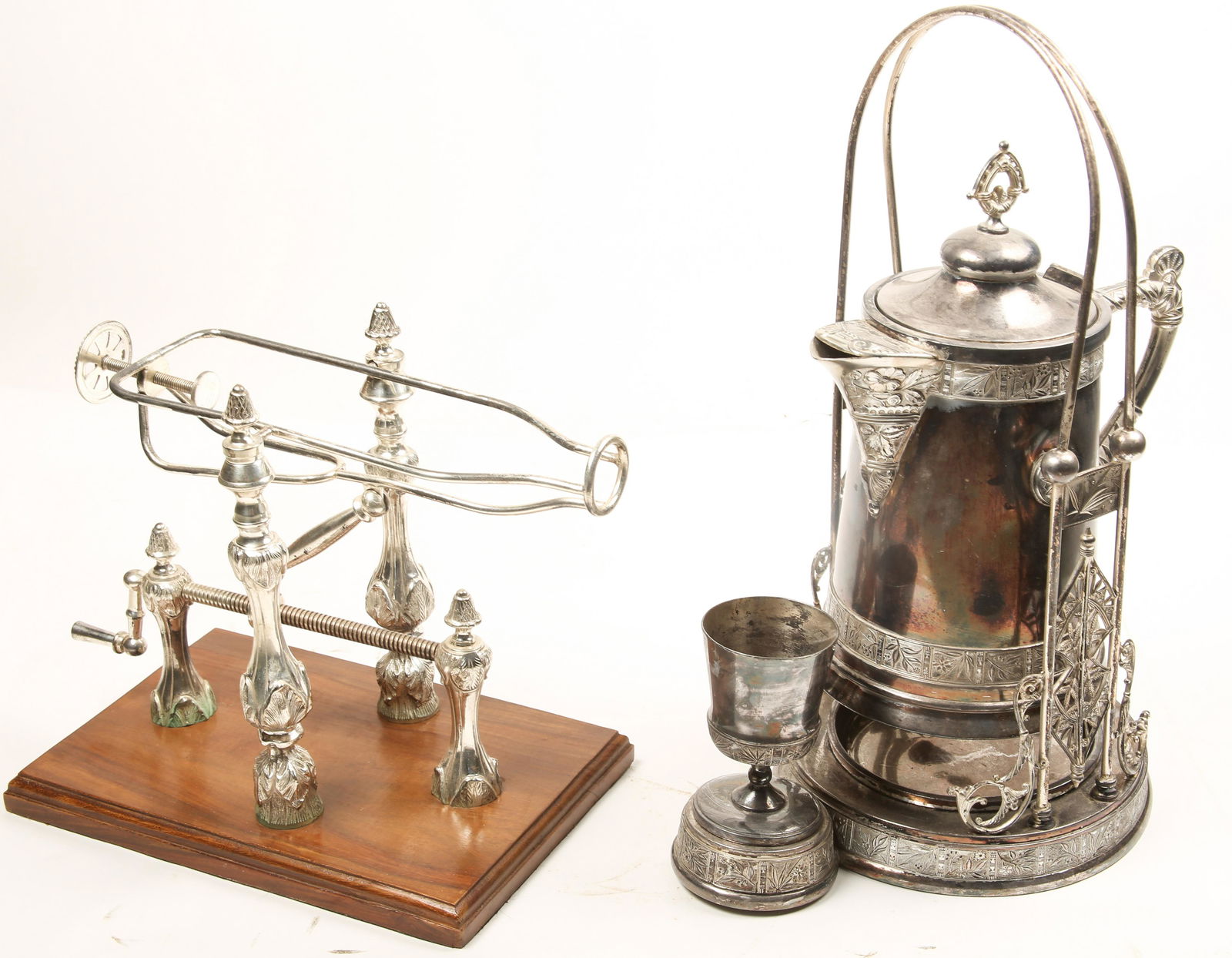 20TH C. SILVER PLATED BEVERAGE SERVEWARE: 20TH C. SILVER PLATED BEVERAGE SERVEWARE 20th century silver plated beverage serveware, includes: Pairpoint Manufacturing Co. pitcher on stand with matching goblet 20" overall height Pitcher: