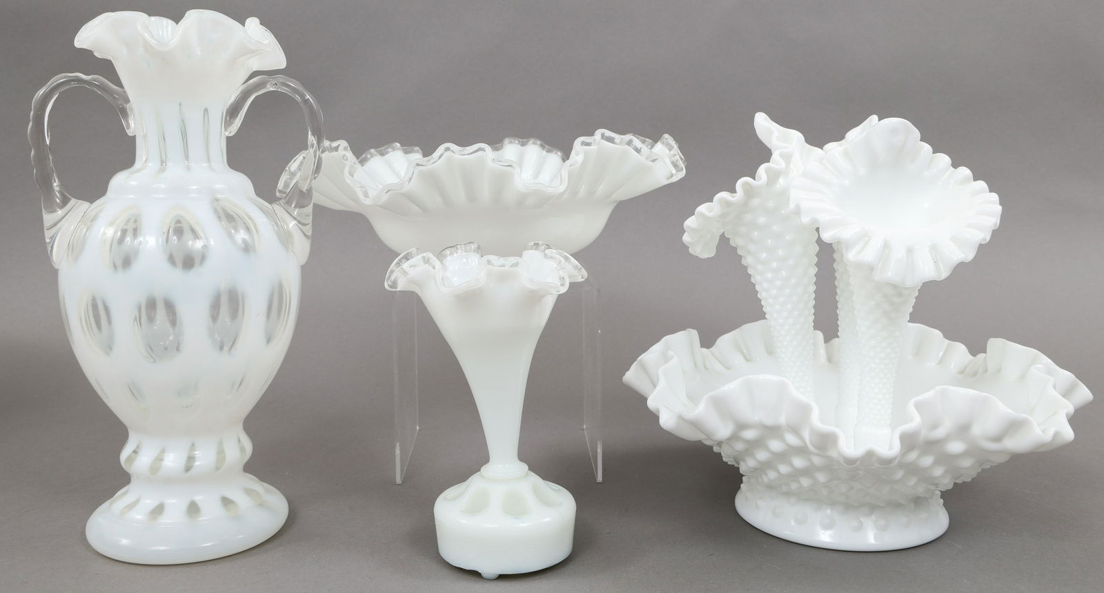 FENTON MILK GLASS - EPERGNES & VASE: FENTON MILK GLASS - EPERGNES & VASE Fenton milk glass items, includes: Coin dot vase, 11 x 6" Four part epergne, 9.75 x 10" Three part silver crest epergne, 6.5 x 11"