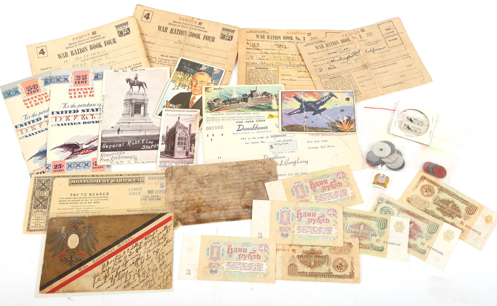ESTATE LOT OF HOMEFRONT & TRAVEL EPHEMERA AND TOKENS: ESTATE LOT OF HOMEFRONT & TRAVEL EPHEMERA AND TOKENS Estate lot of ephemera and tokens from the late 19th century to the mid 20th century. Includes: Hand written post card from the Montgomery, Wa