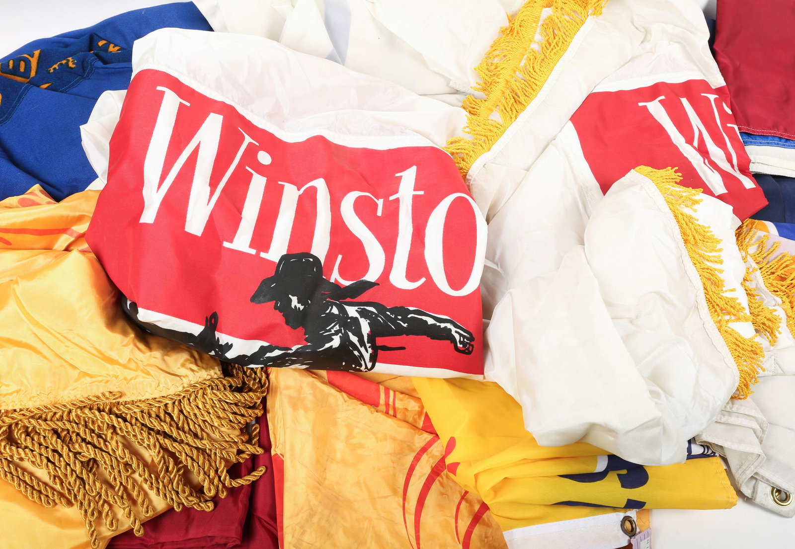 INTERNATIONAL & SPORTS FLAG AND BANNER LOT: INTERNATIONAL & SPORTS FLAG AND BANNER LOT Large lot of banners and flags. Lot includes 24 flags flags and 7 multicolored banners. Country flags include France, Italy, Canada and more. Sport