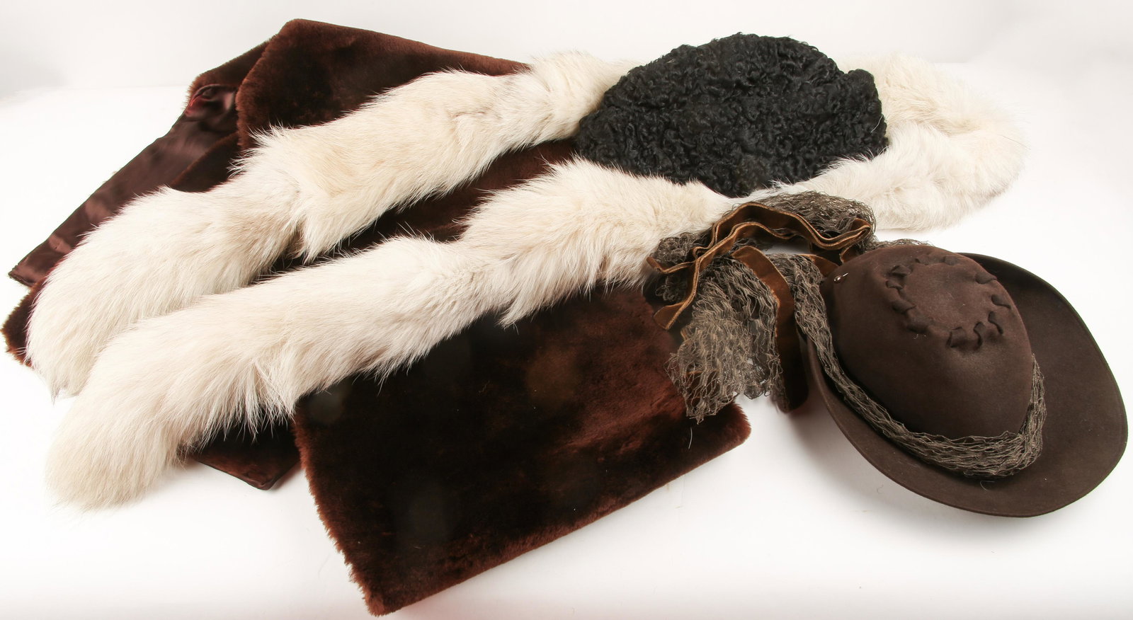 20TH C. WOMEN'S FUR & SYNTHETIC FUR HATS & STOLES: 20TH C. WOMEN'S FUR & SYNTHETIC FUR HATS & STOLES 20th century era women's hats and stoles, includes: North King J.J. Seifter & Sons, dyed persian lamb hat 22" internal circumference