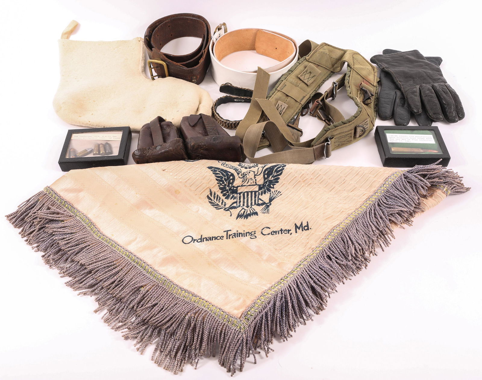 U.S. MILITARIA BONANZA LOT - LUGER AMMO, BELTS, & MORE: U.S. MILITARIA BONANZA LOT - LUGER AMMO, BELTS, & MORE U.S. militaria bonanza lot, includes: Six 9mm German Luger rounds of ammunition One .30-06 round, CIA manufacture for the Bay of Pigs invasion W