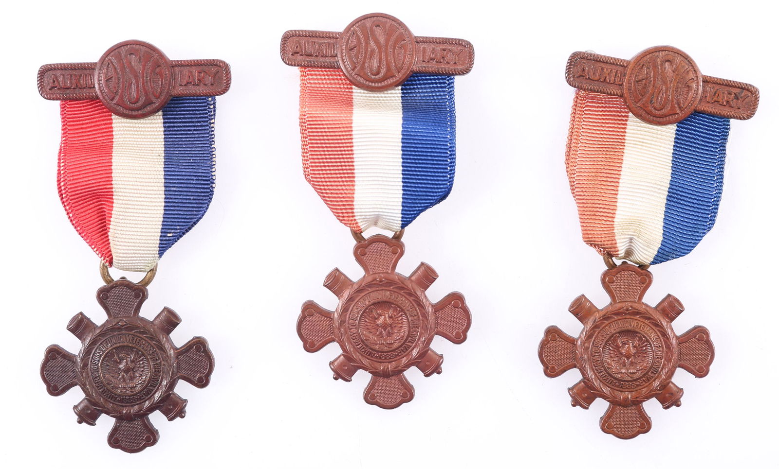 AUXILIARY SONS OF UNION VETERANS BADGES - LOT OF 3: AUXILIARY SONS OF UNION VETERANS BADGES - LOT OF 3 Lot of three Auxiliary Sons of Union Veterans membership badges. Suspended from red, white, and blue ribbon, one pendant is marked Aug. C. Frank
