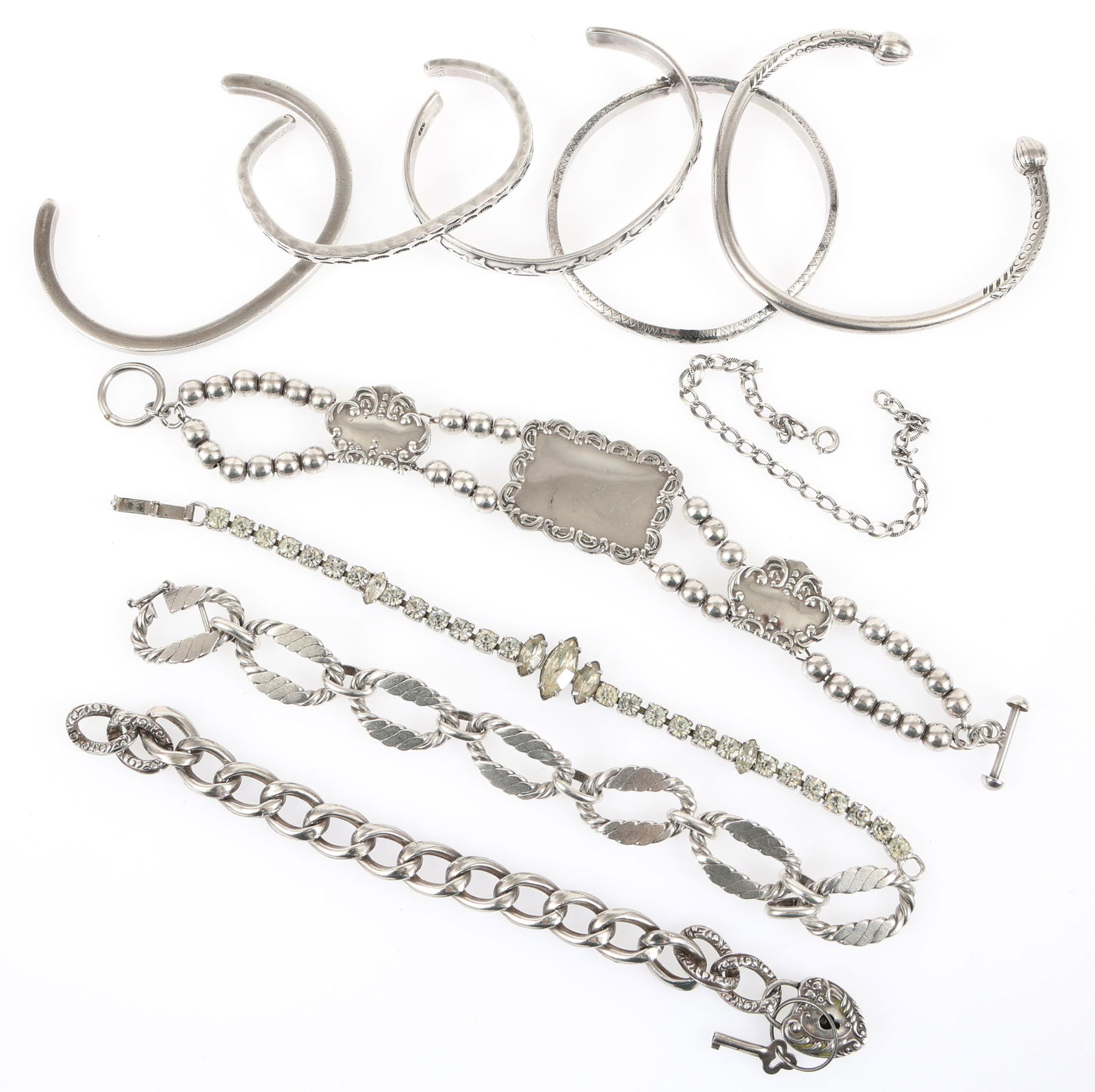 STERLING SILVER FASHION BRACELETS: STERLING SILVER FASHION BRACELETS Sterling silver fashion bracelets, includes: Four cuffs One bangle Five flexible link bracelets Size: 7" to 8.5" Weight: 212g