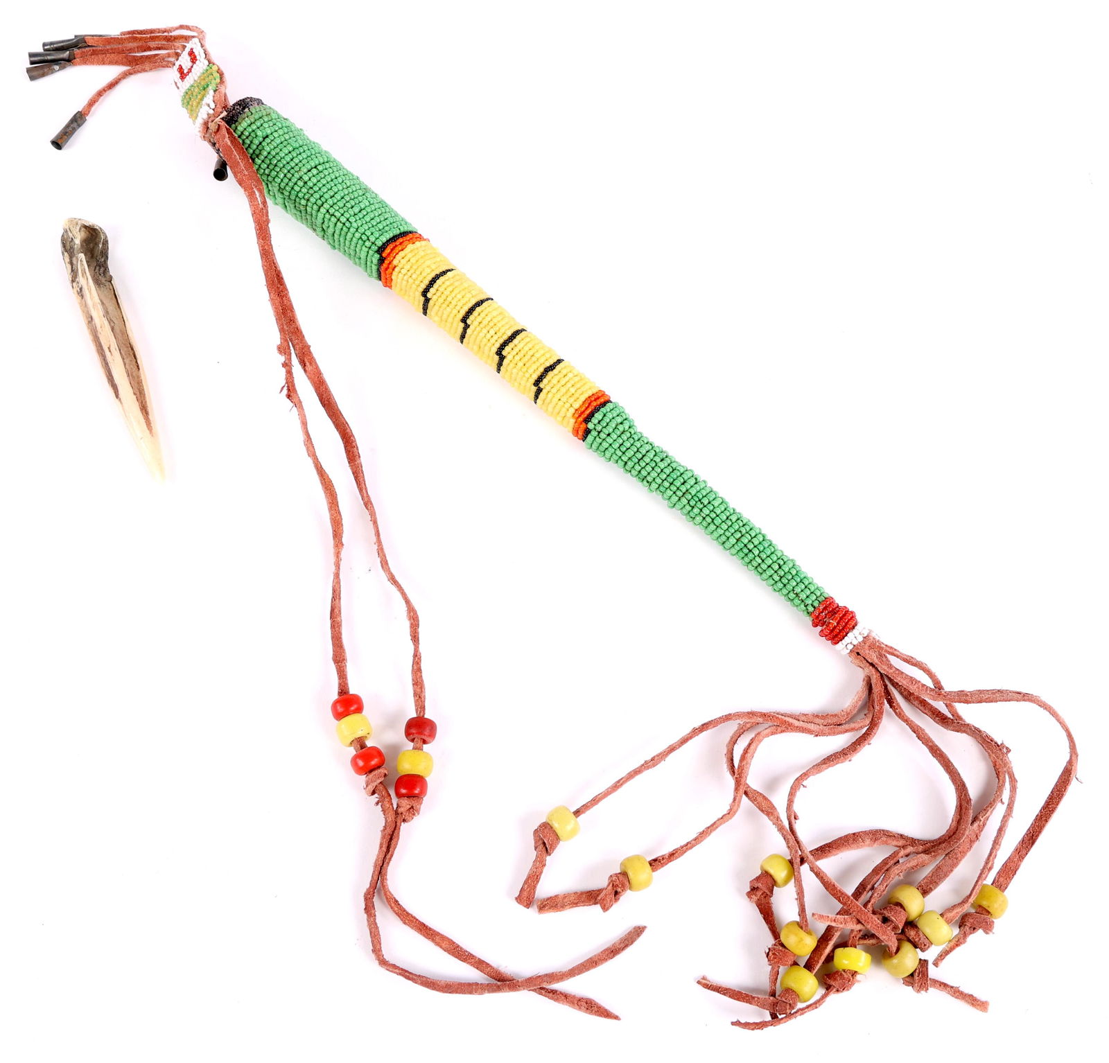 EARLY 20TH C. SIOUX MADE TOURIST TRADE AWL POUCH: EARLY 20TH C. SIOUX MADE TOURIST TRADE AWL POUCH Early 20th century, Sioux made tourist trade awl pouch with seed glass beaded exterior, and carved bone awl. Size: 15"