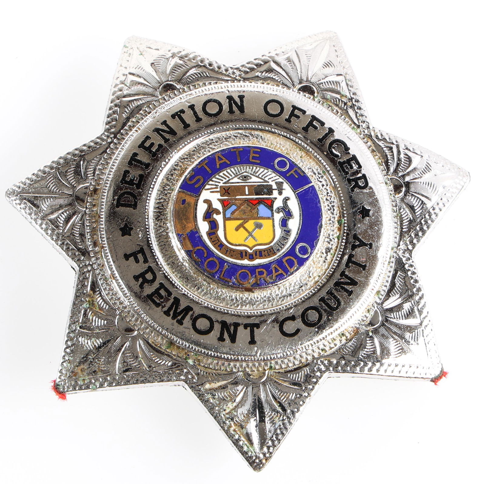 FREMONT COUNTY COLORADO DETENTION OFFICER BADGE: FREMONT COUNTY COLORADO DETENTION OFFICER BADGE Obsolete Fremont County, Colorado Detention Officer badge. Marked C.W. Nielsen Chehalis, WA. Measurements: 2.75 x 2.75"