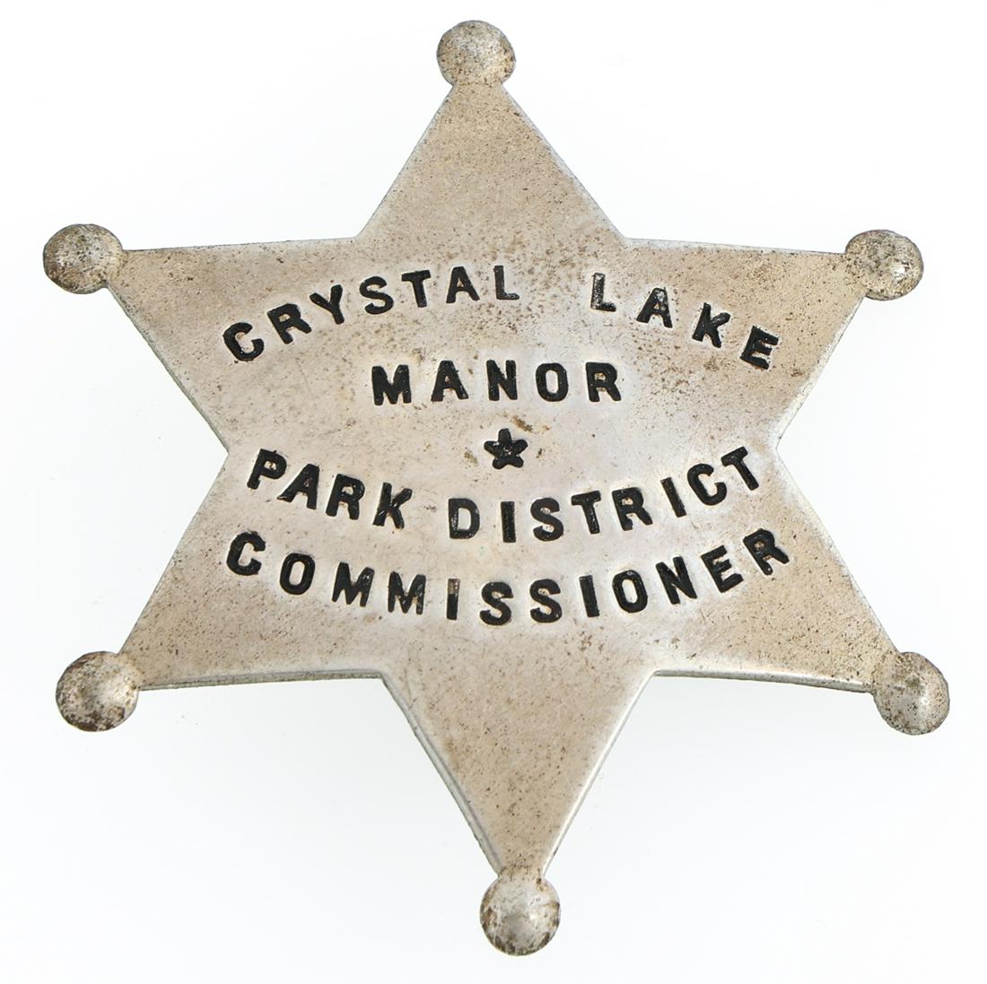 CRYSTAL LAKE ILLINOIS PARK DISTRICT COMMISSIONER BADGE: CRYSTAL LAKE ILLINOIS PARK DISTRICT COMMISSIONER BADGE Obsolete Crystal Lake Manor, Illinois Park District Commissioner badge. Unmarked. Measurements: 2 x 2"