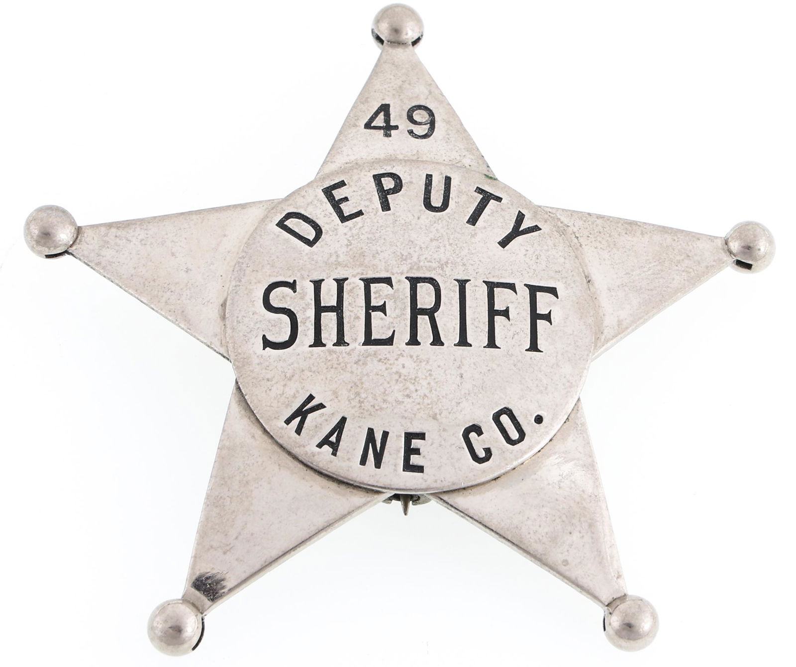 KANE COUNTY ILLINOIS DEPUTY SHERIFF BADGE NO. 49: KANE COUNTY ILLINOIS DEPUTY SHERIFF BADGE NO. 49 Obsolete Kane County, Illinois, Deputy Sheriff badge. Number 49. Marked Detective Publishing Co. Chicago to the back. Also crudely engraved w