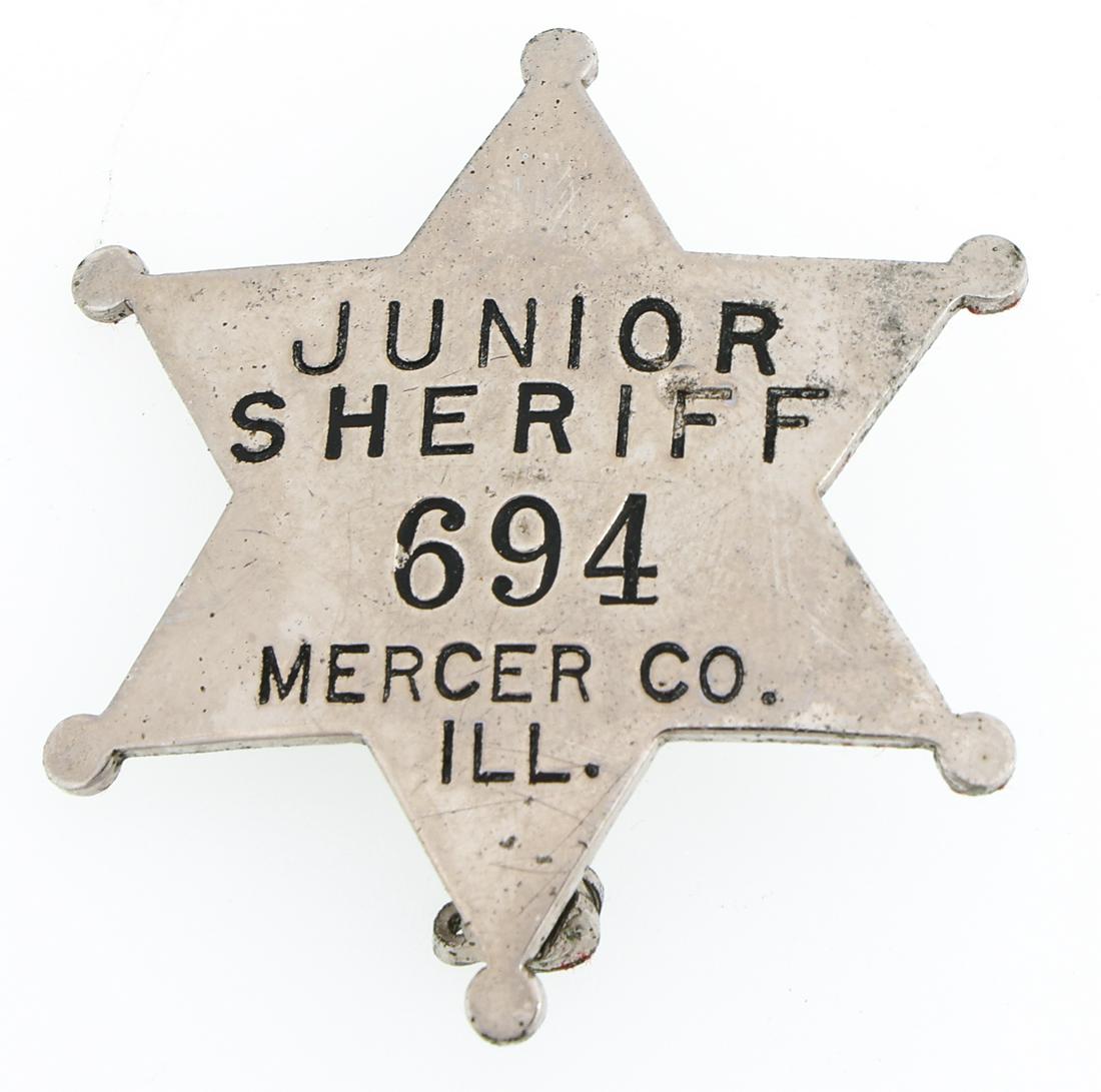 MERCER COUNTY ILLINOIS JUNIOR SHERIFF BADGE NO. 694: MERCER COUNTY ILLINOIS JUNIOR SHERIFF BADGE NO. 694 Obsolete Mercer County, Illinois Junior Sheriff badge. Number 694. Unmarked. Measurements: 1.75 x 1.75"